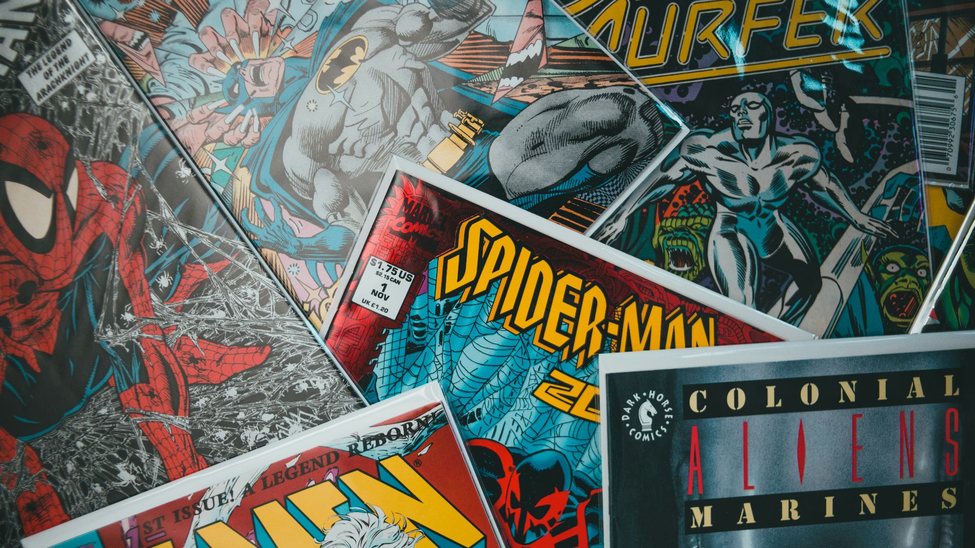 a pile of comics sitting next to each other