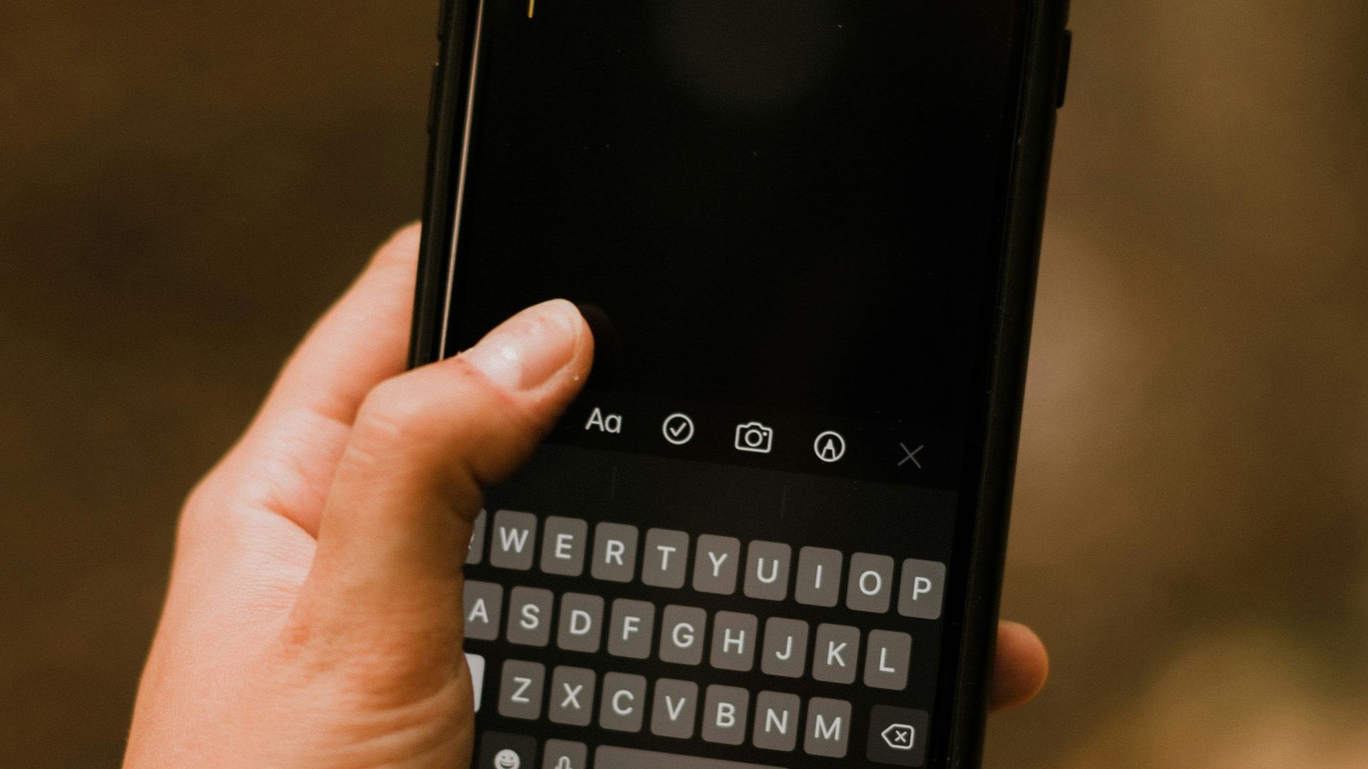 person holding black android smartphone