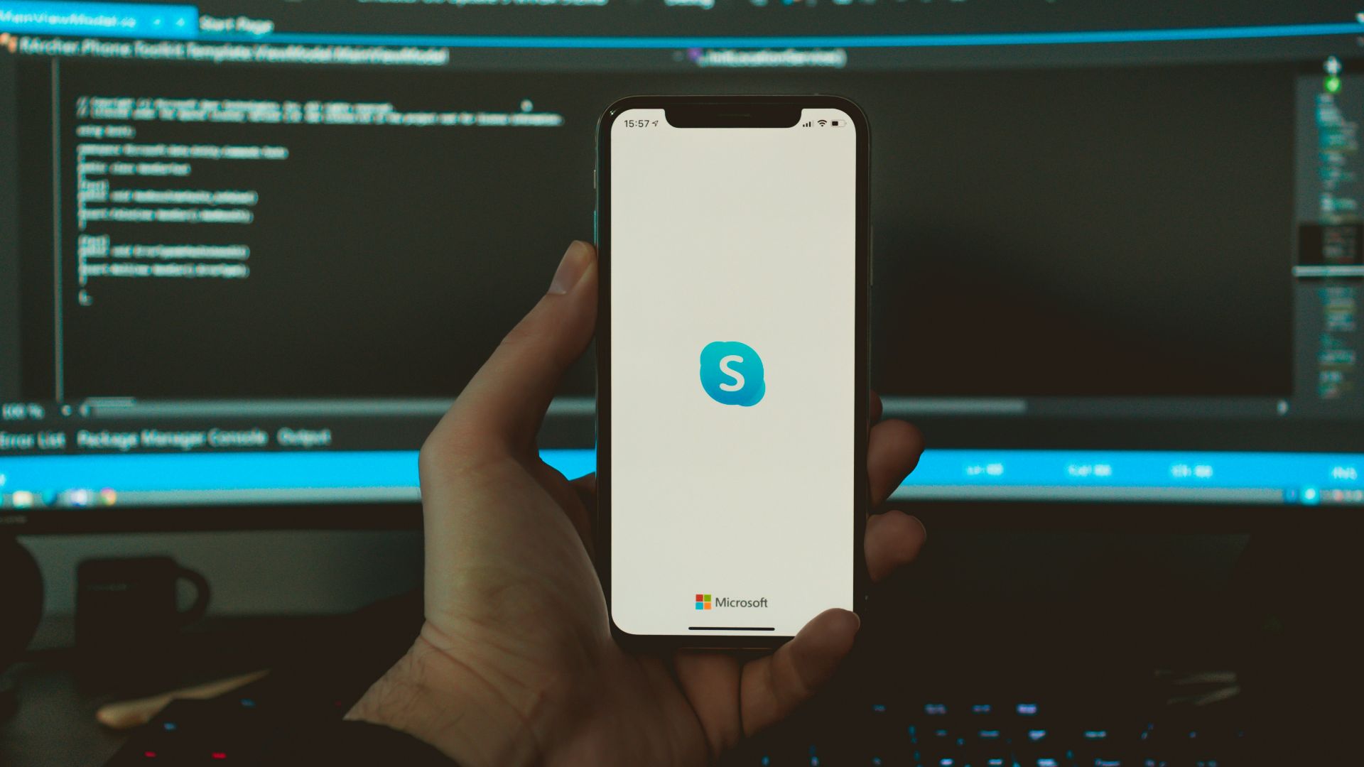 person holding white iphone 5 c