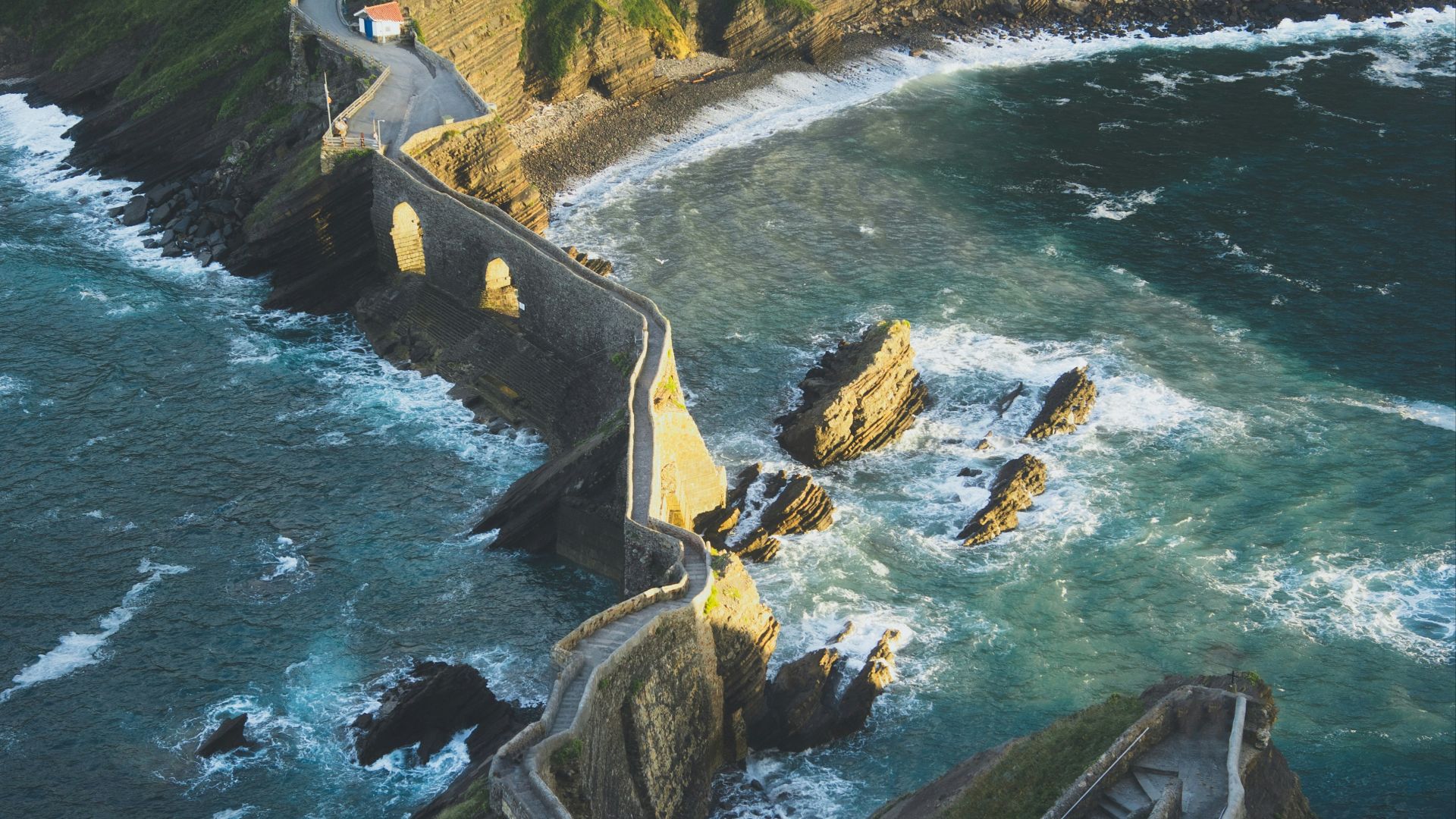 aerial view of bridge by the body of water