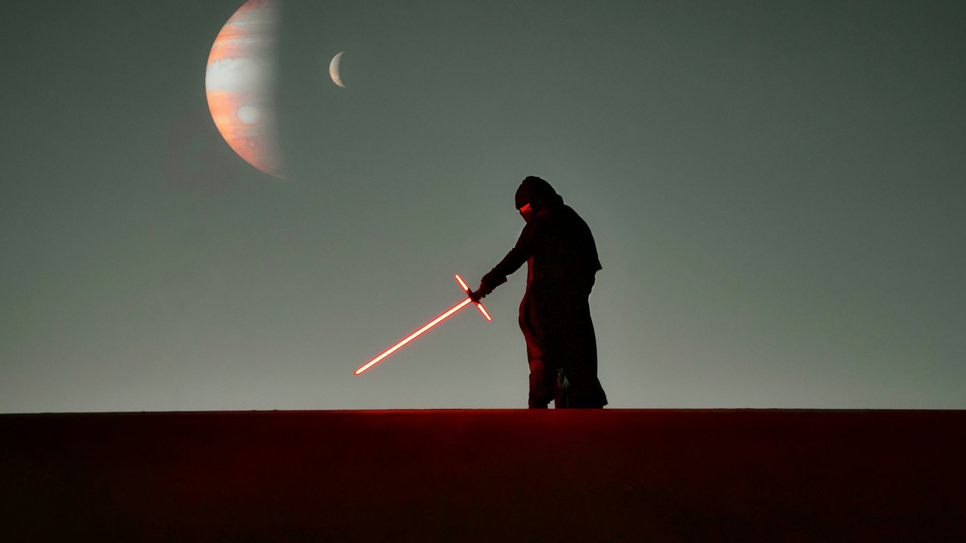 a man that is standing in the dark