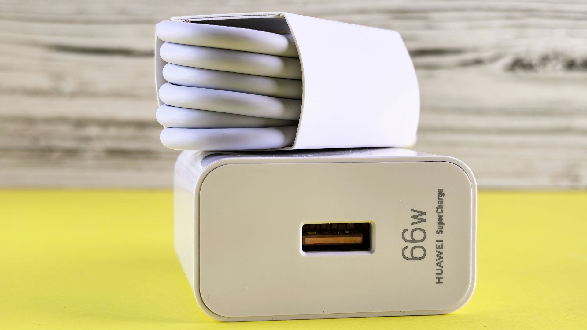 A close up of a cell phone charger on a table