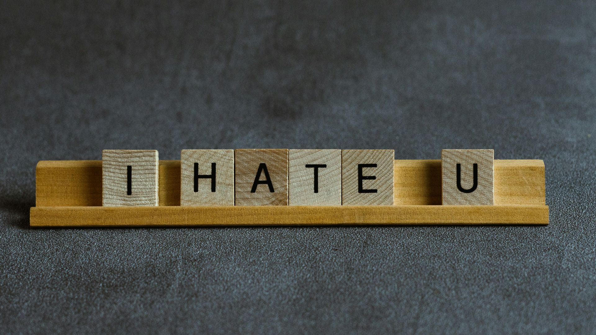 brown wooden i love you letter