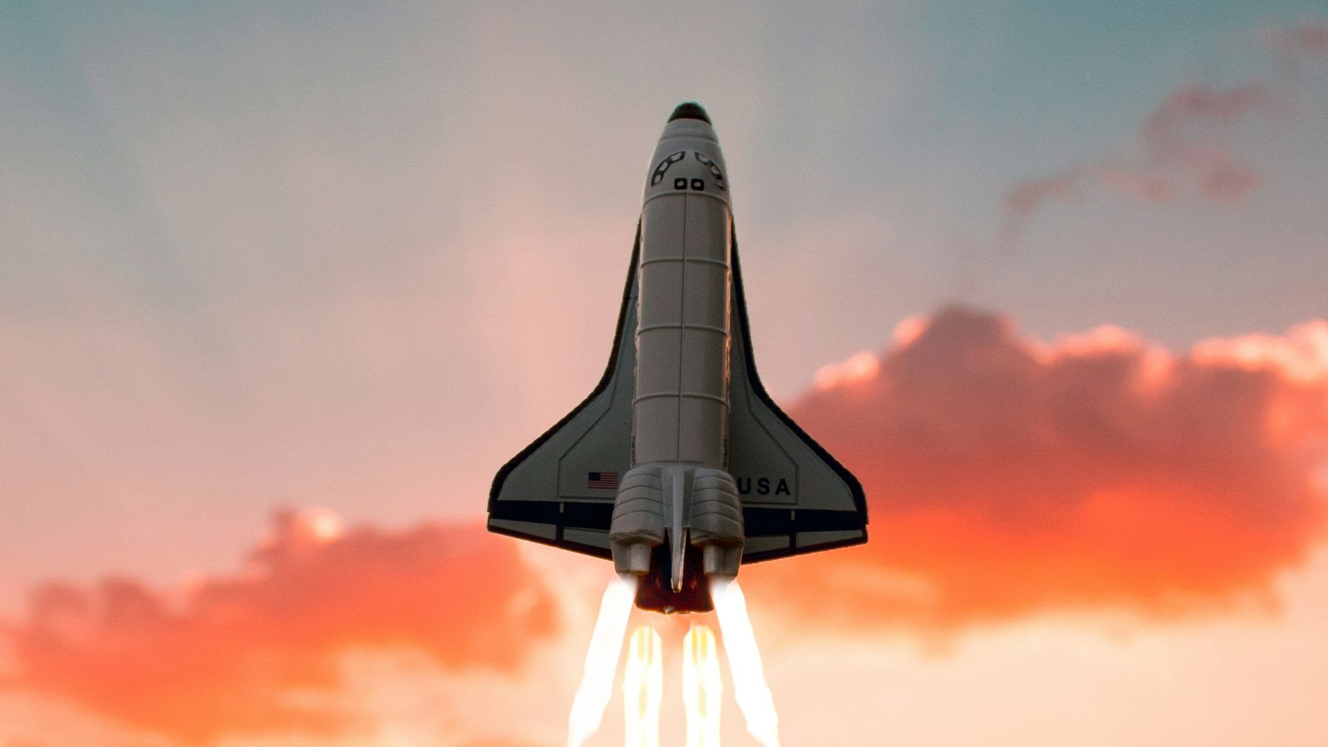 white and black plane flying in the sky during daytime