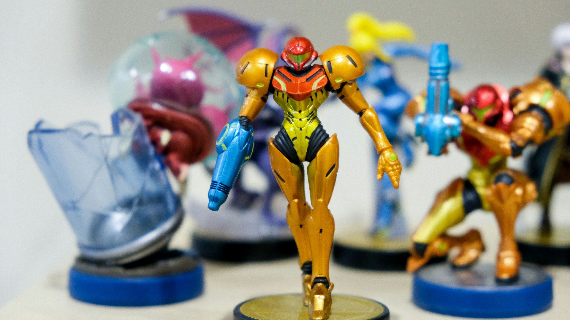 man wearing yellow and red costume character scale model