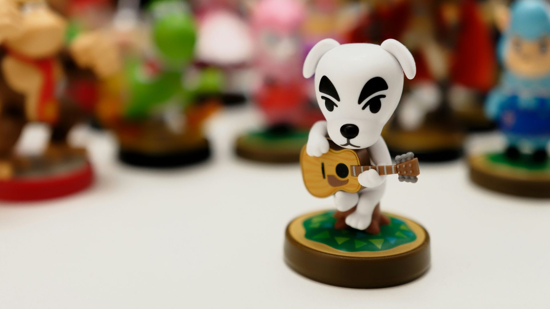 mickey mouse plastic toy on white table