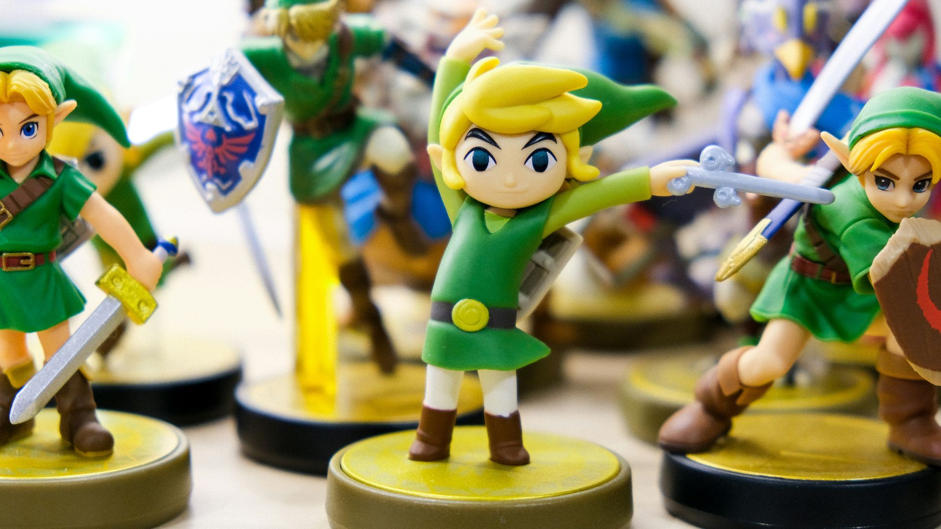 selective focus photography of Link vinyl figures