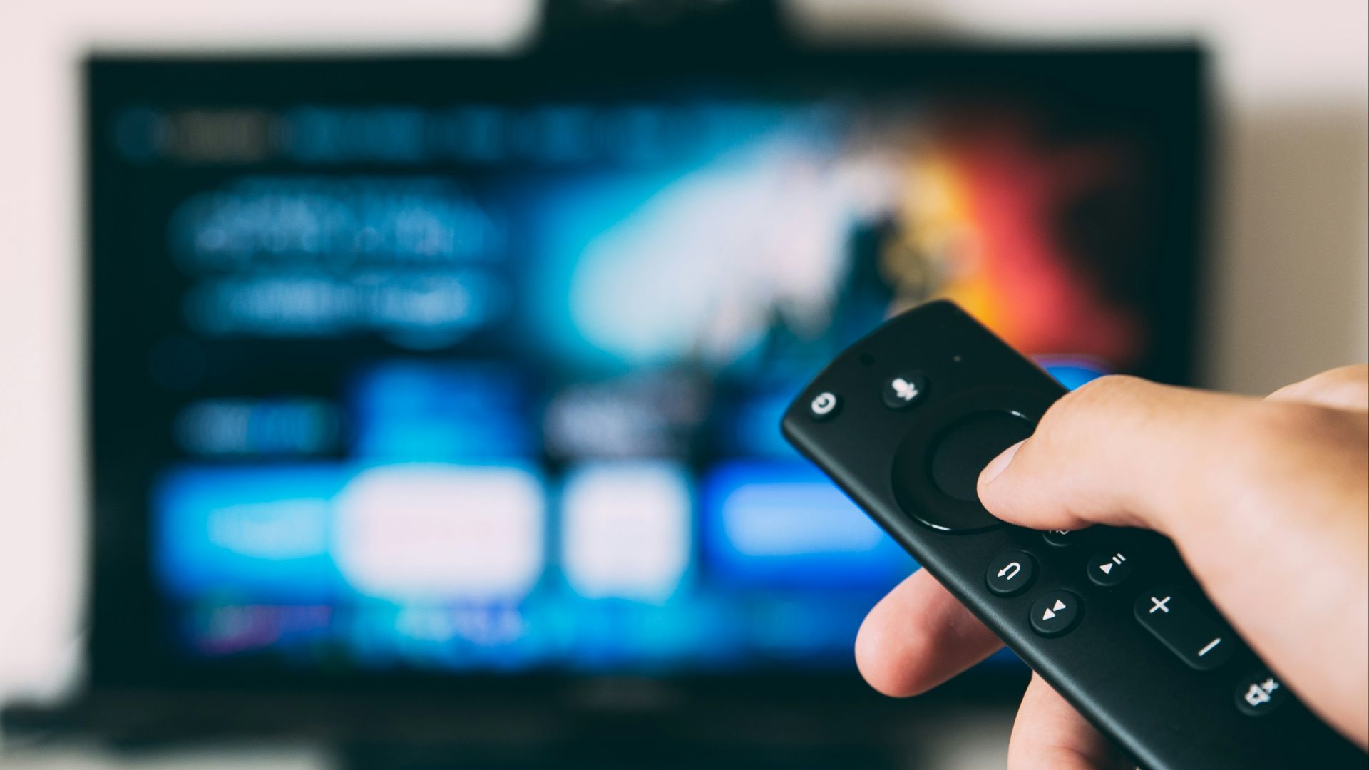turned-on flat screen television