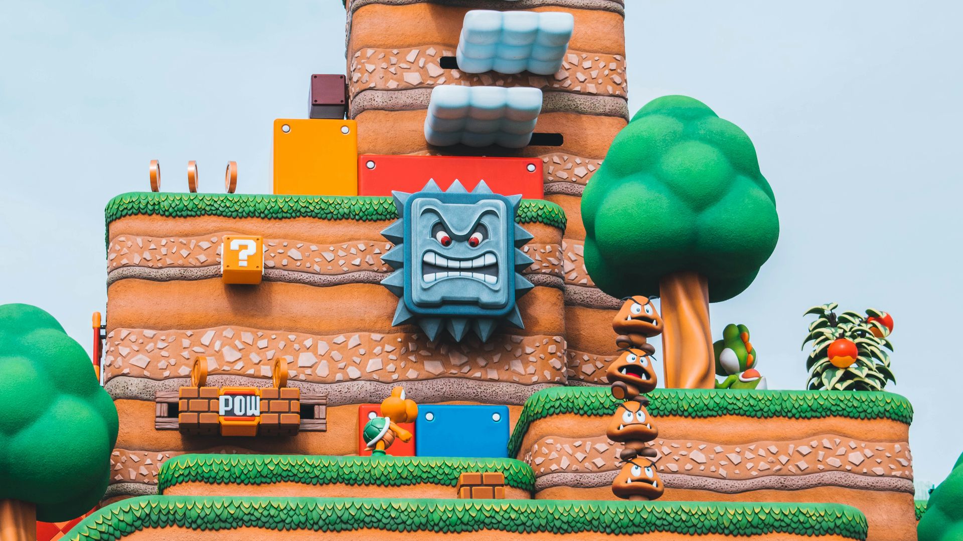 blue green and brown concrete building under blue sky during daytime