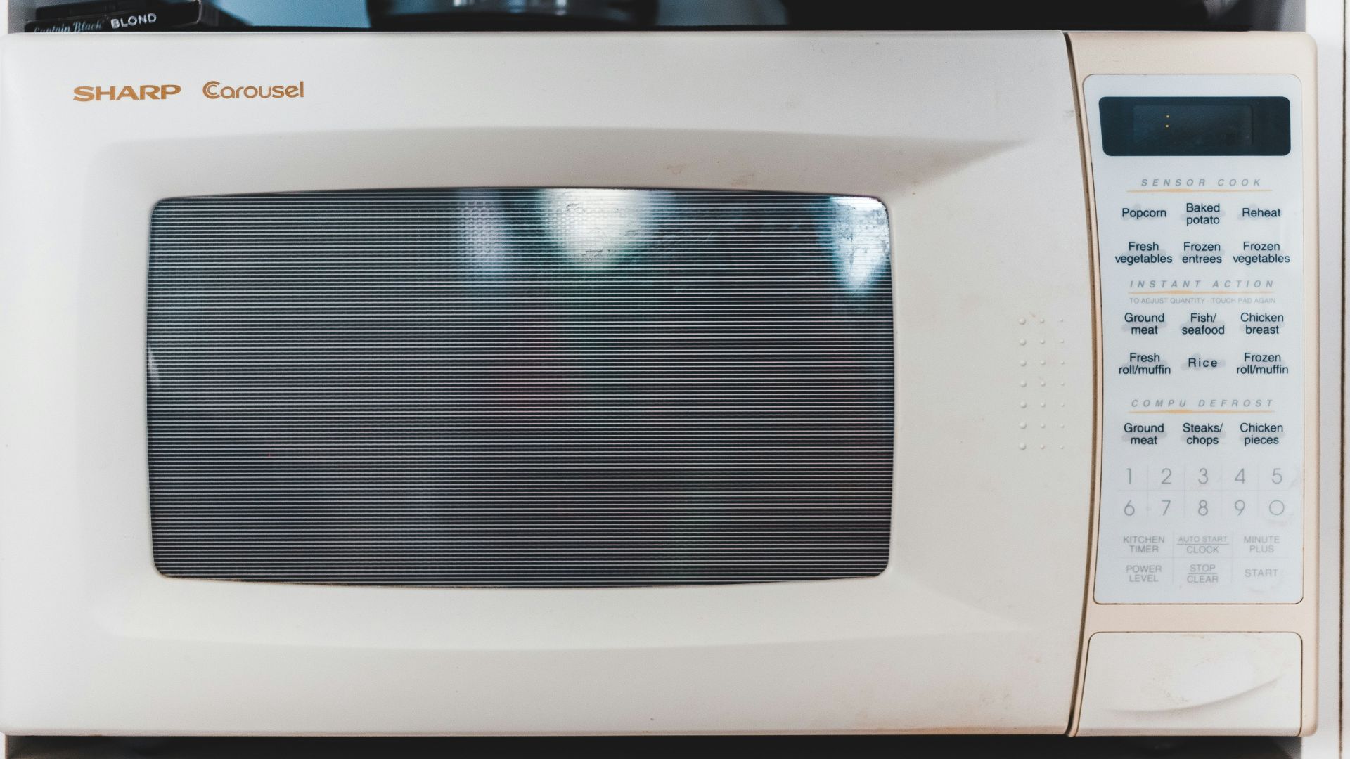 white microwave oven turned off