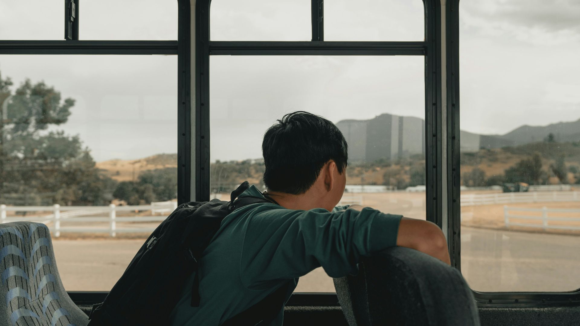man sitting inside vehicle
