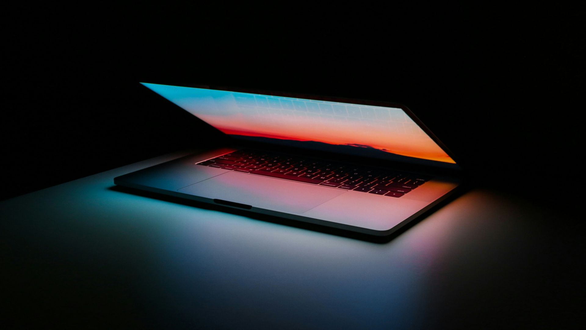 gray and black laptop computer on surface