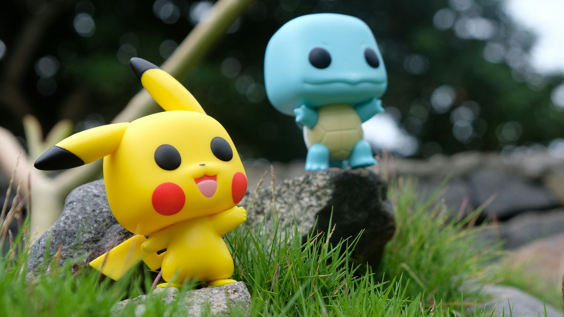 yellow and white duck plush toy on green grass during daytime