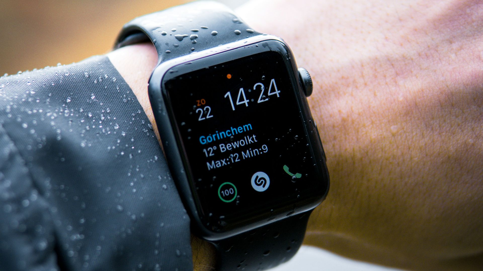 person wearing Apple Watch at 14:24