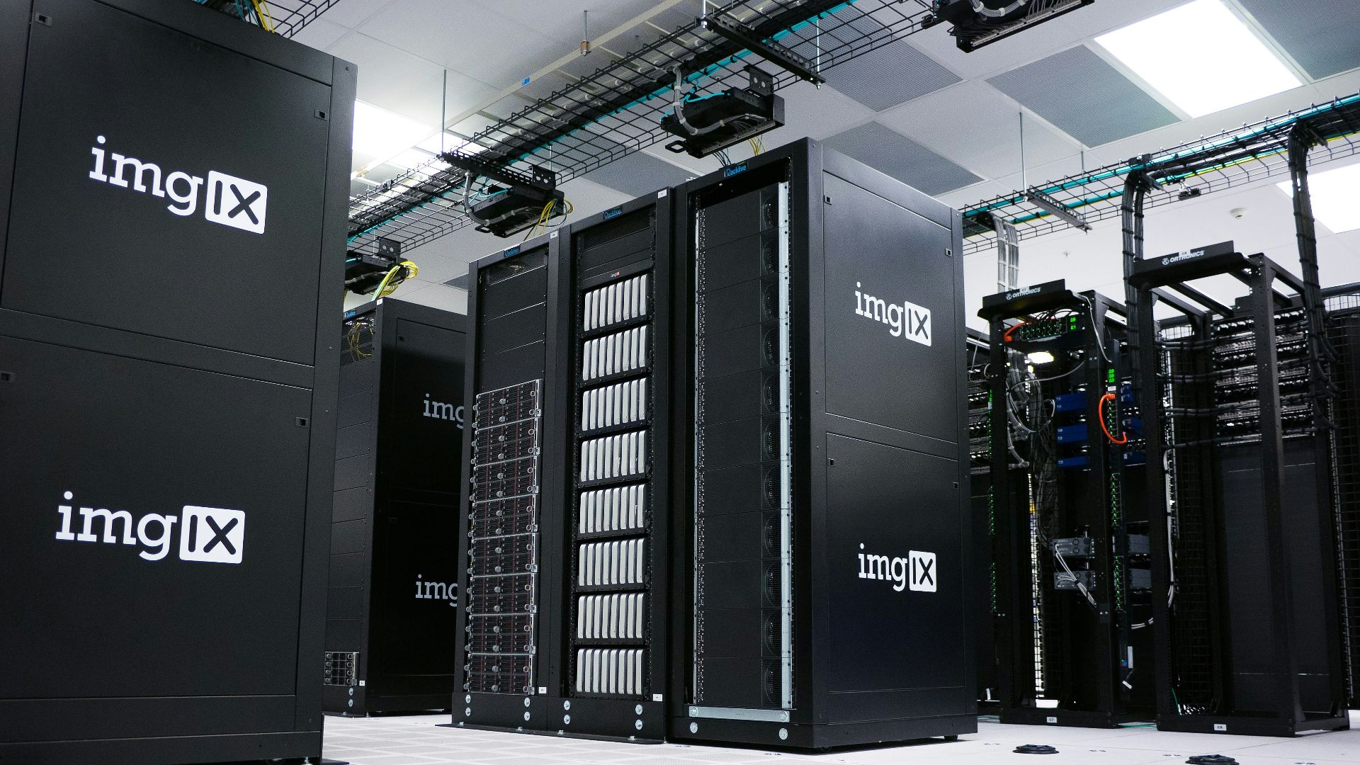 img IX mining rig inside white and gray room