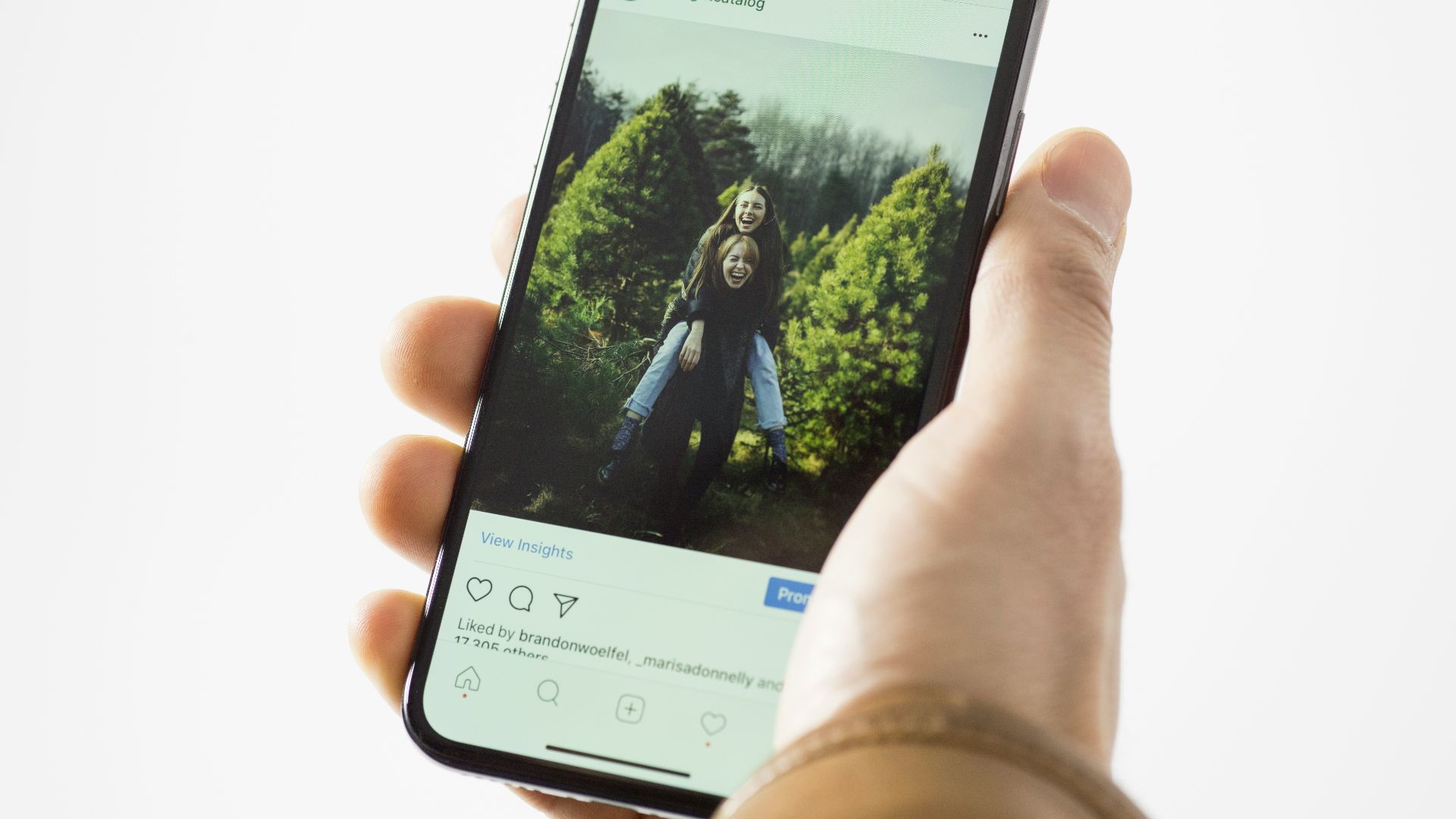person using black smartphone