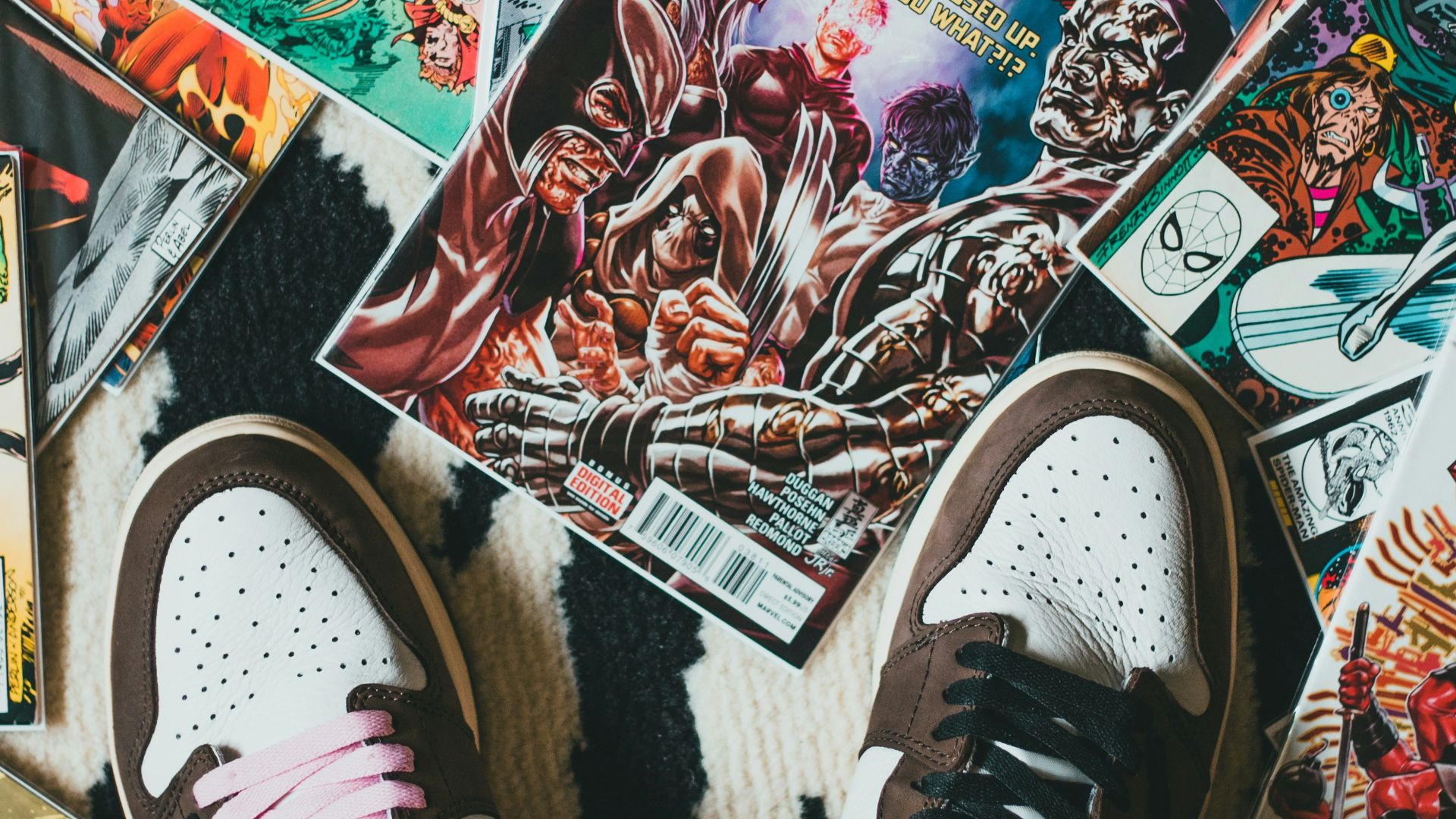 person wearing black and white sneakers