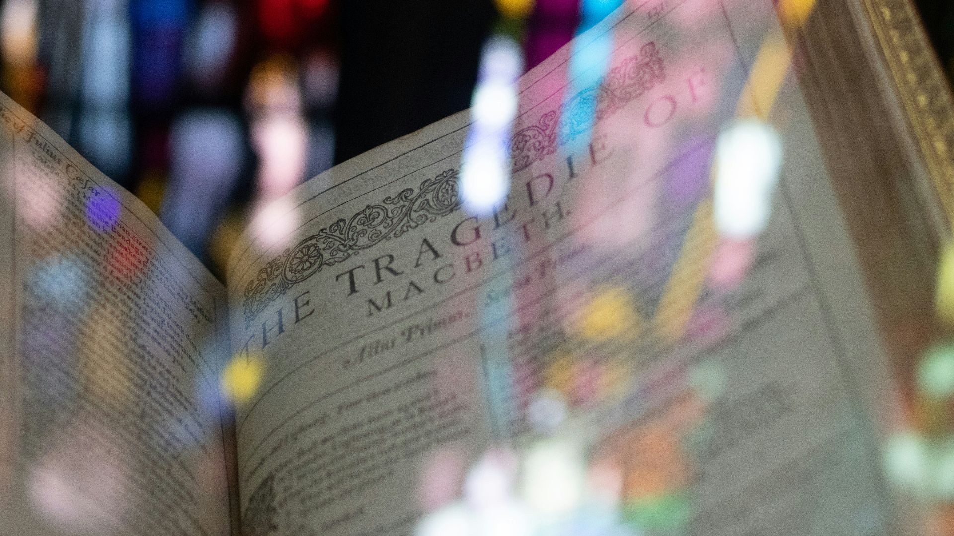 a close up of an open book on a table