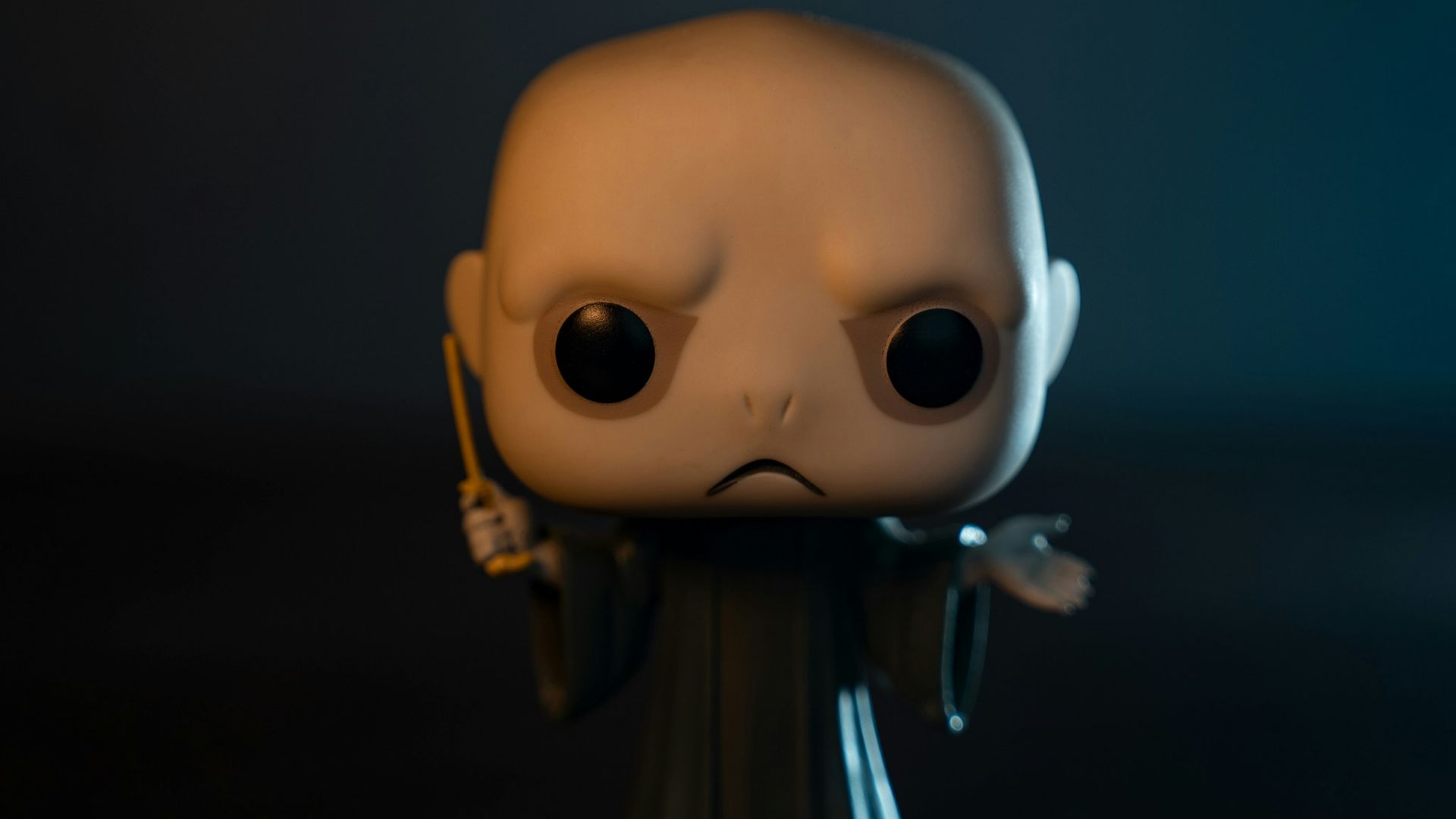 brown cartoon character in black shirt