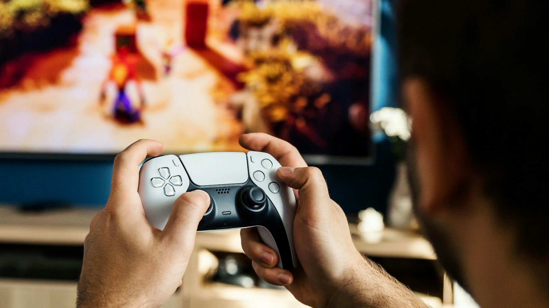 a man playing a video game on the nintendo wii