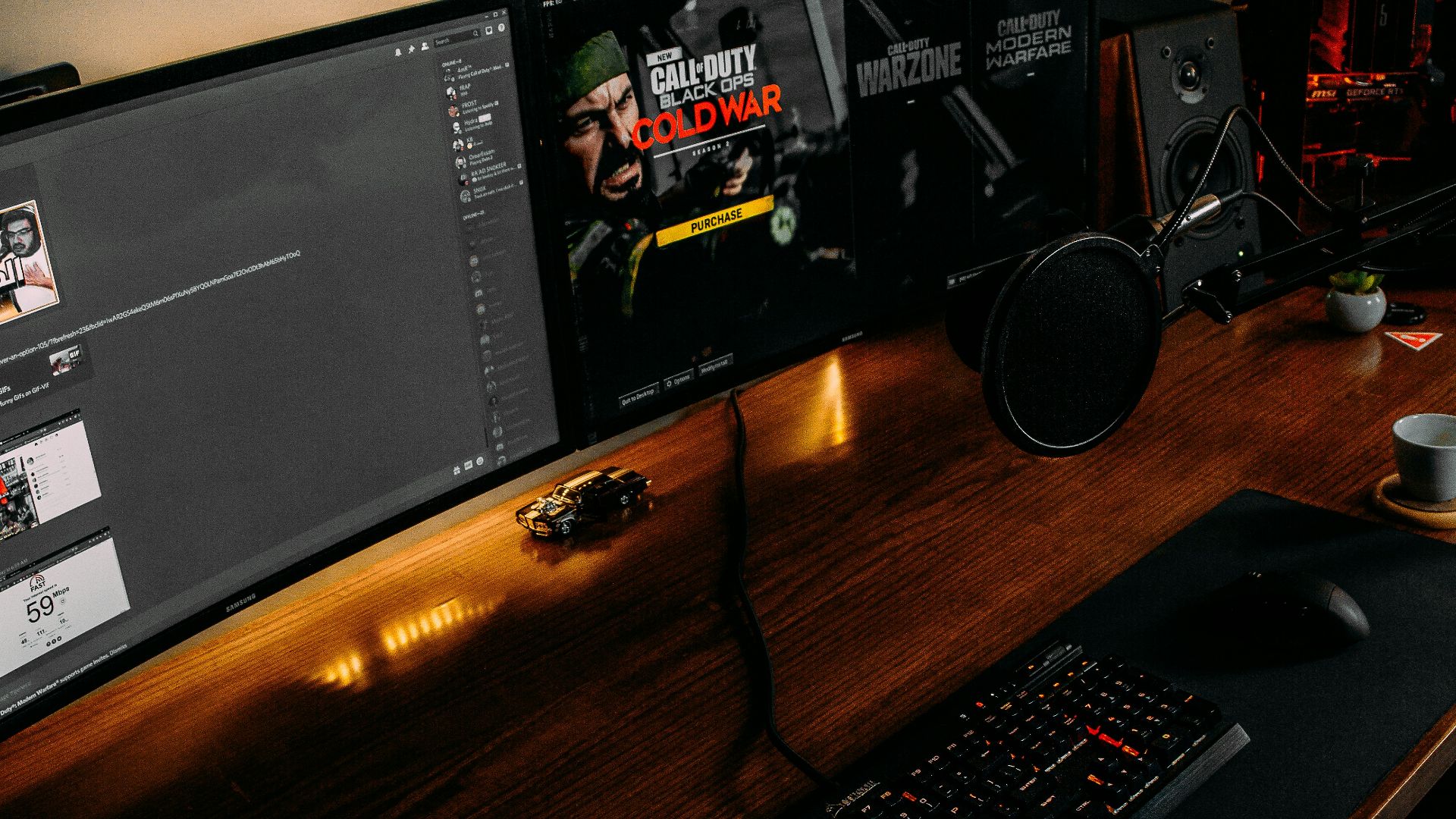 black flat screen computer monitor turned on beside black computer keyboard