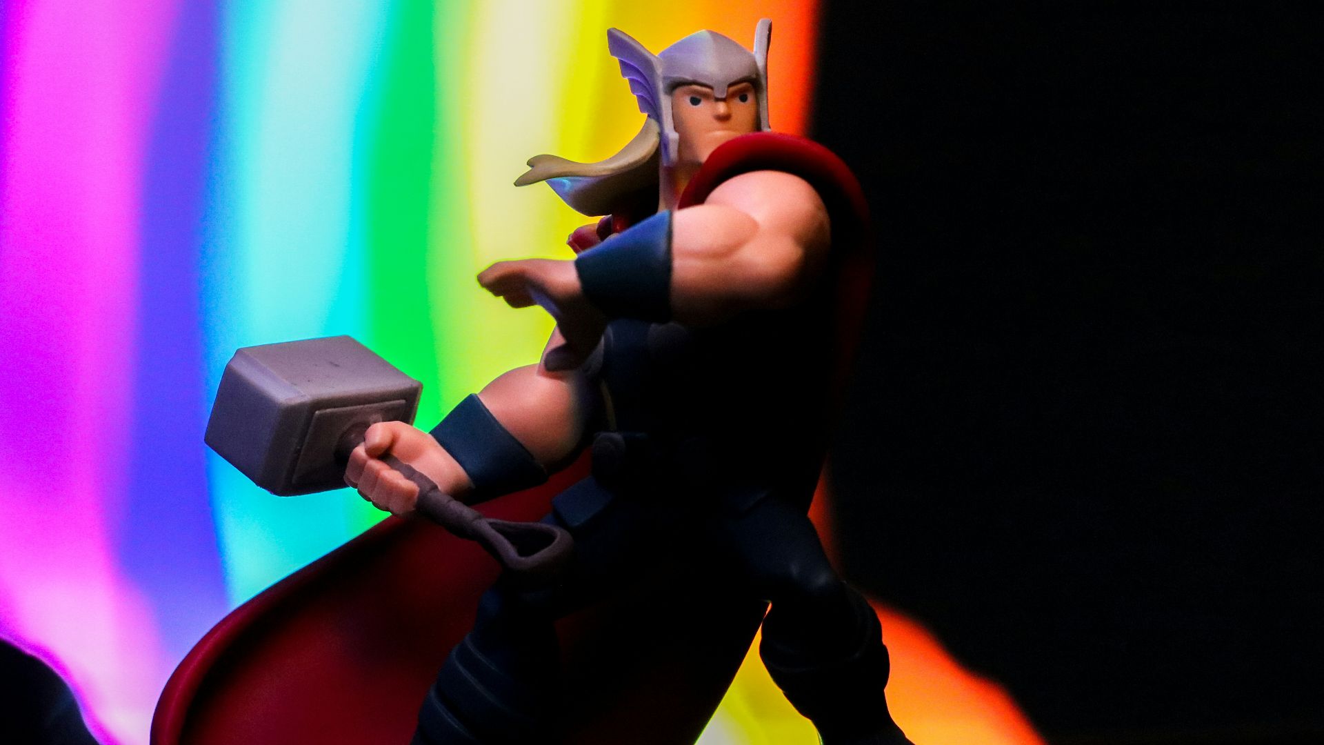 a toy of a man with a hammer in his hand