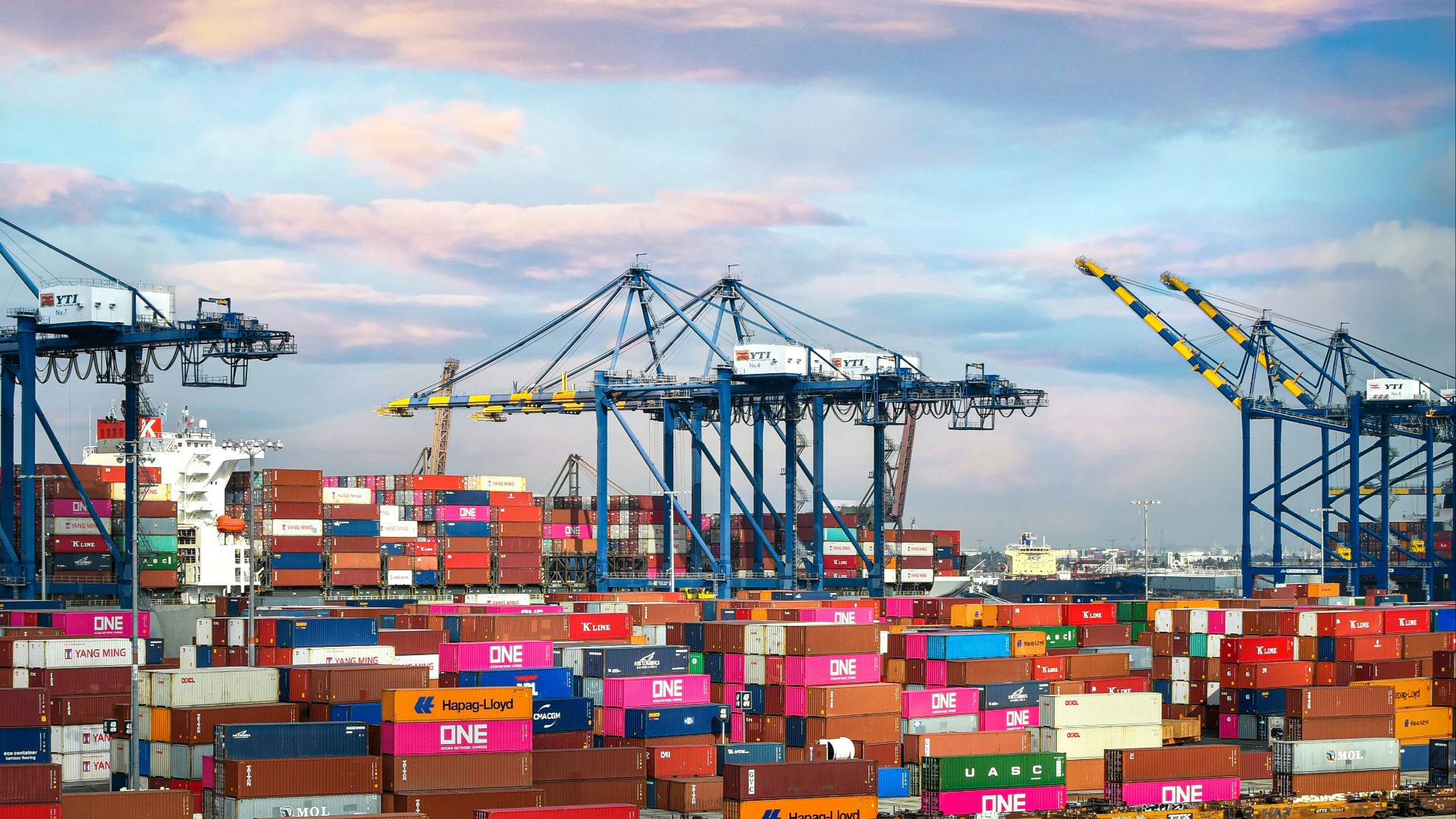 red and blue cargo containers