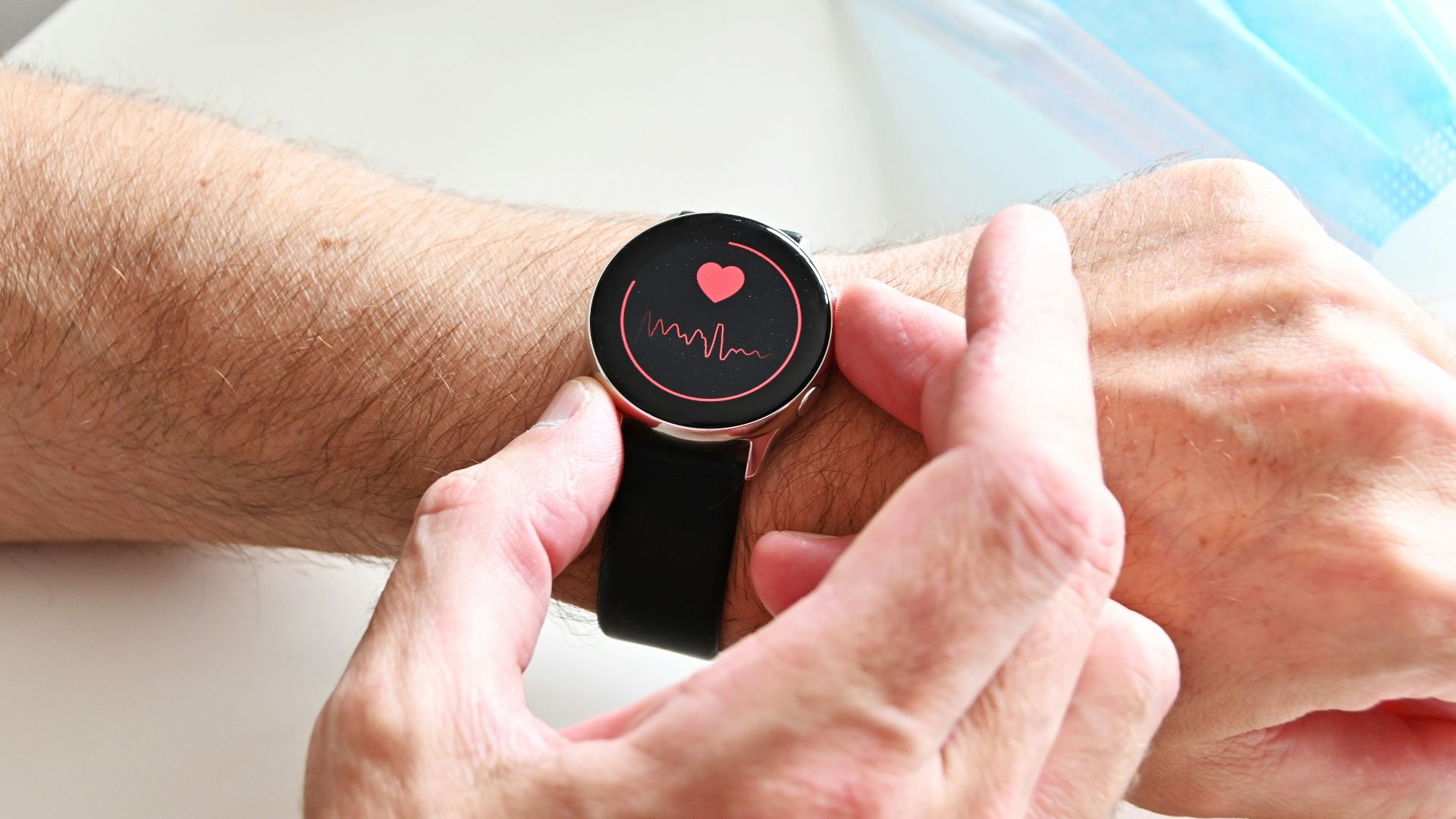 a person holding a stopwatch