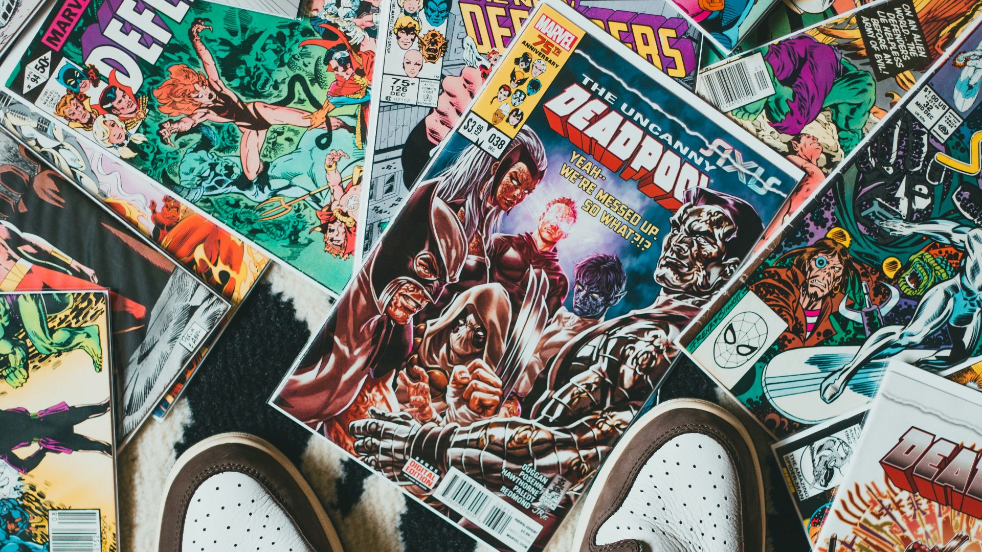 person wearing black and white sneakers