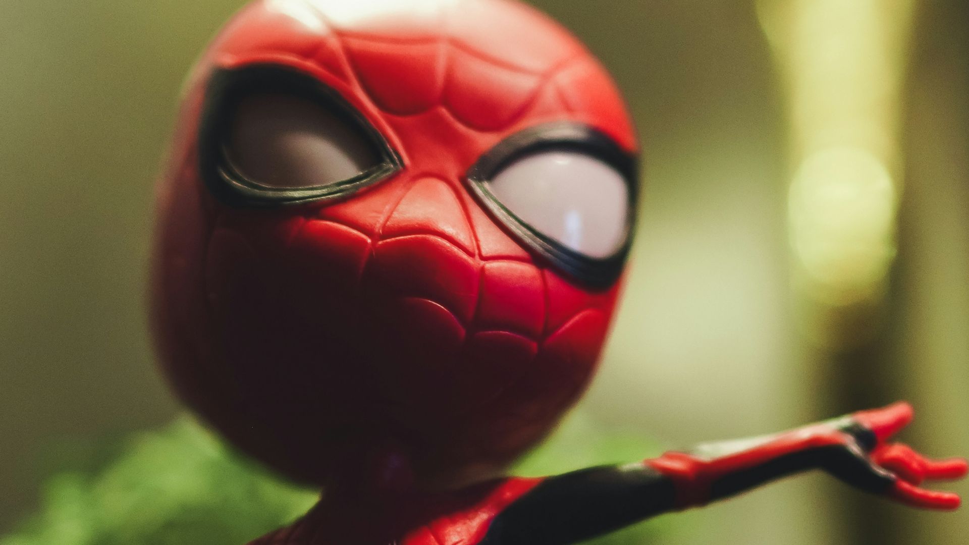 a close up of a toy spider man