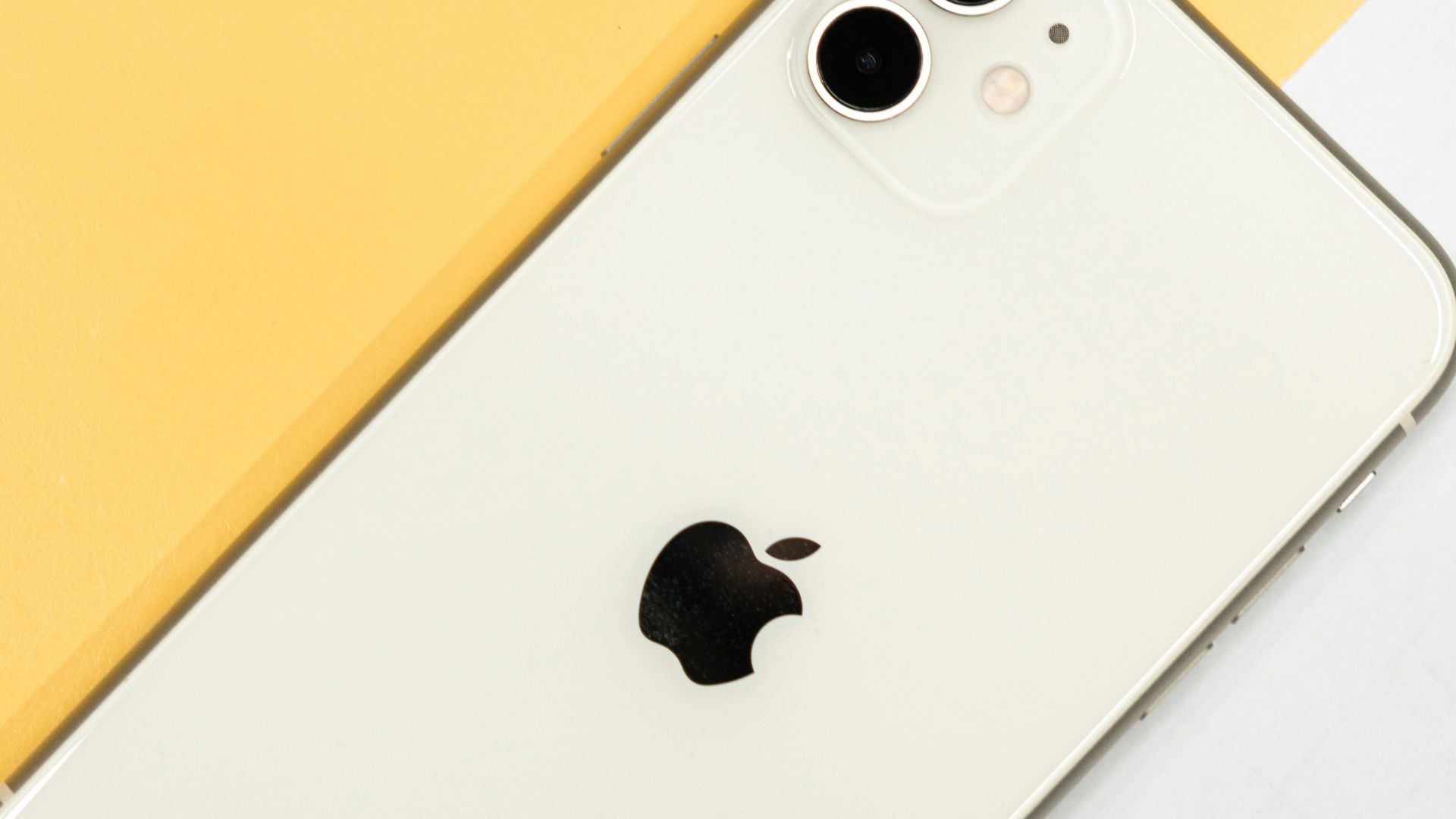 silver iphone 6 on white table