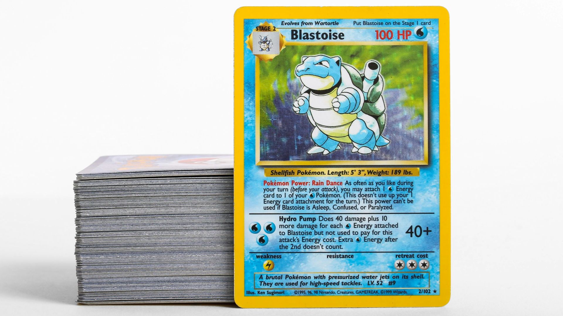 a stack of pokemon cards sitting on top of each other