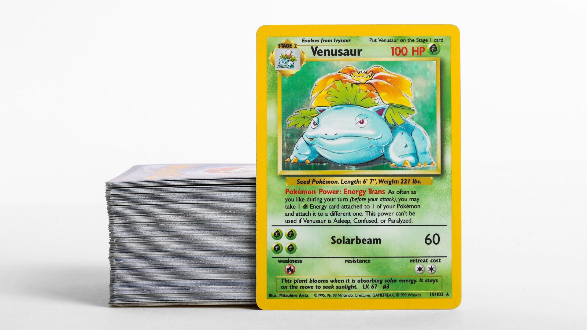 a stack of pokemon cards sitting on top of each other