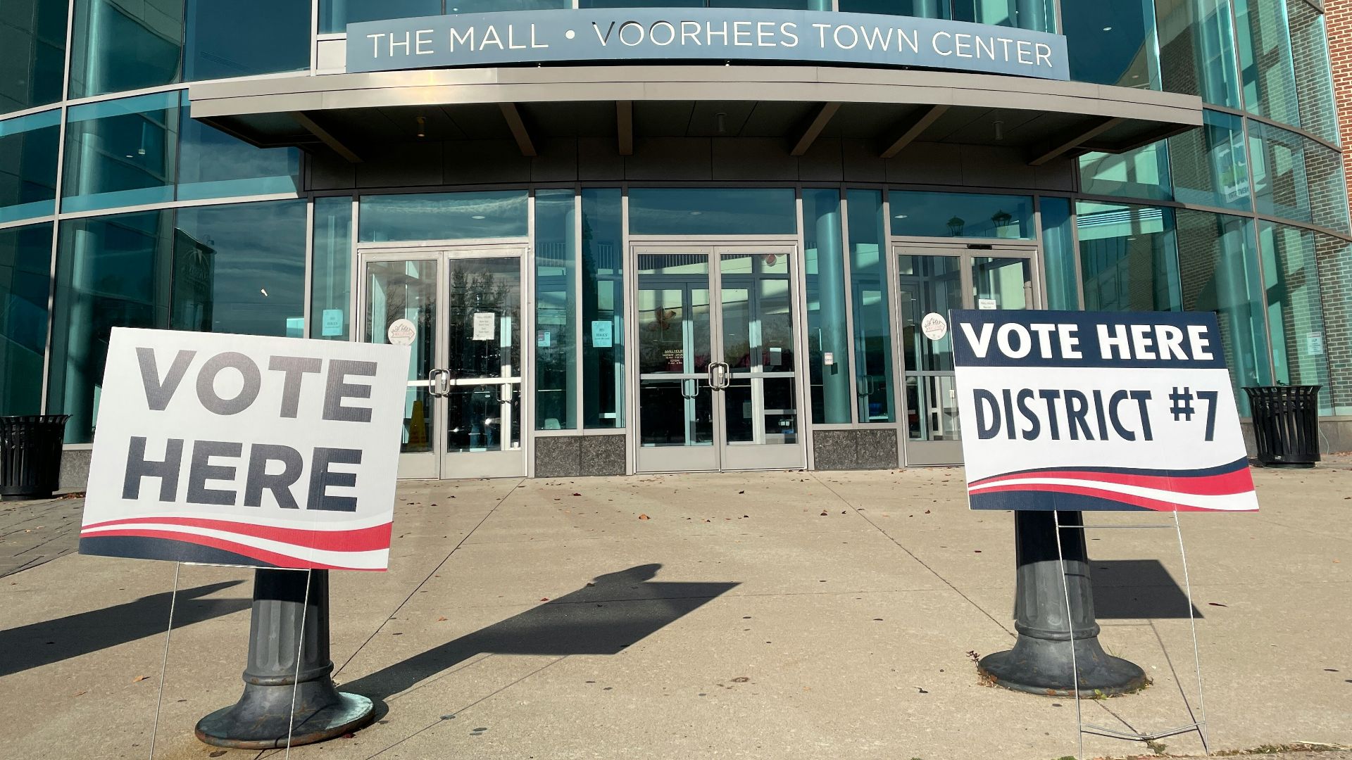 a few signs in front of a building