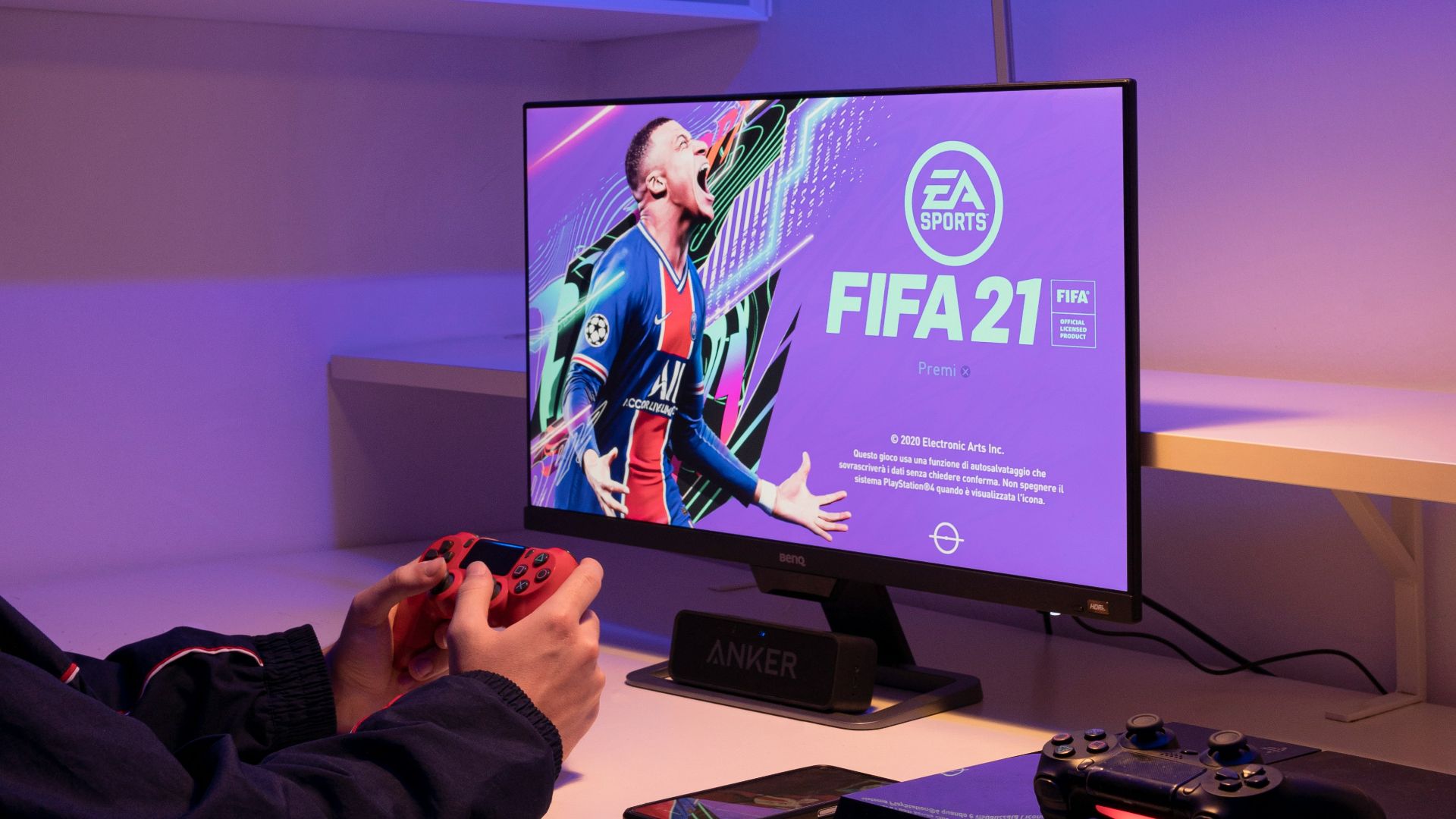 black flat screen tv turned on near black remote control