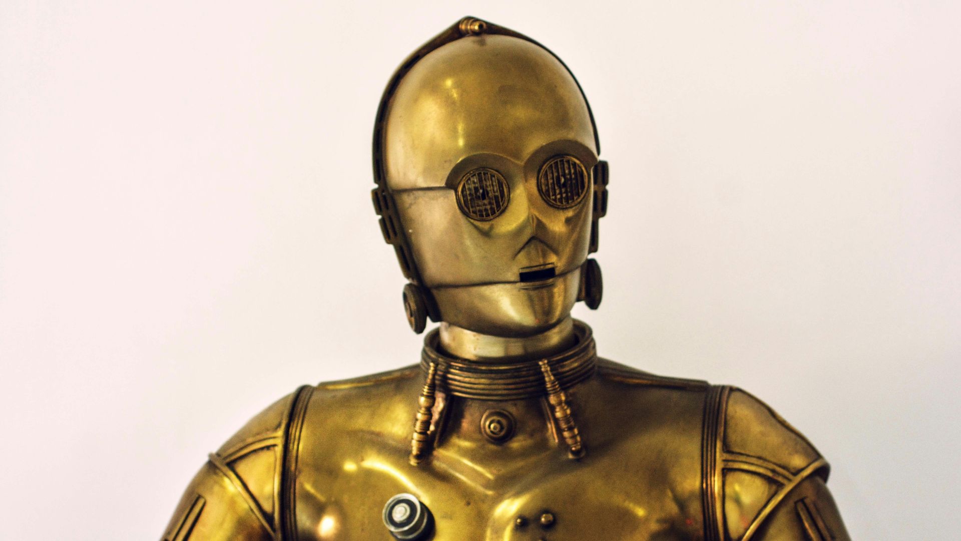 person wearing gold mask and mask