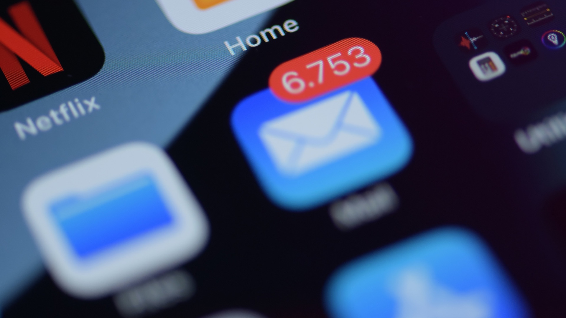 a close up of a cell phone with various app icons