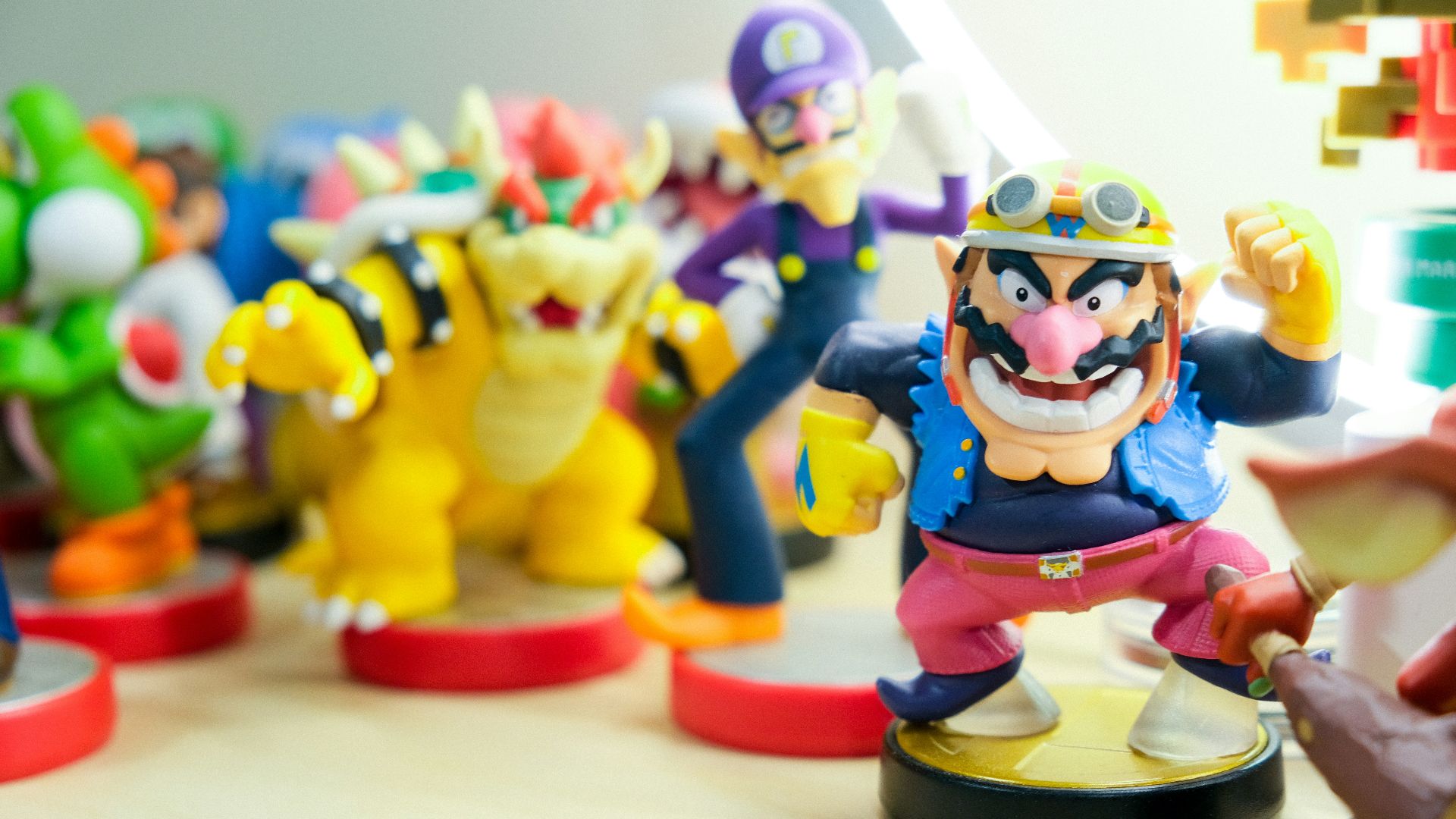 Super Mario vinyl figures on table