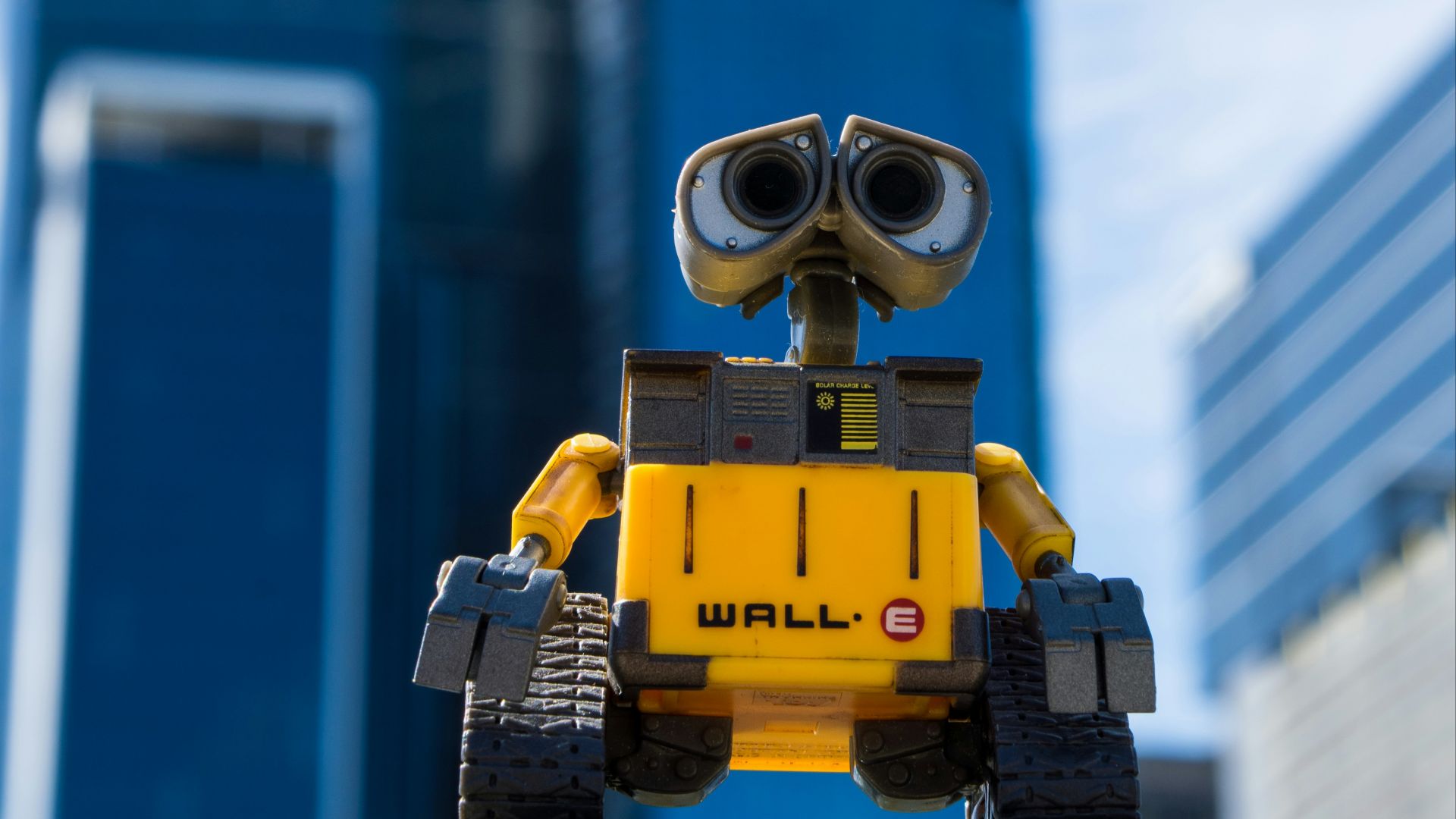 yellow and gray robot toy