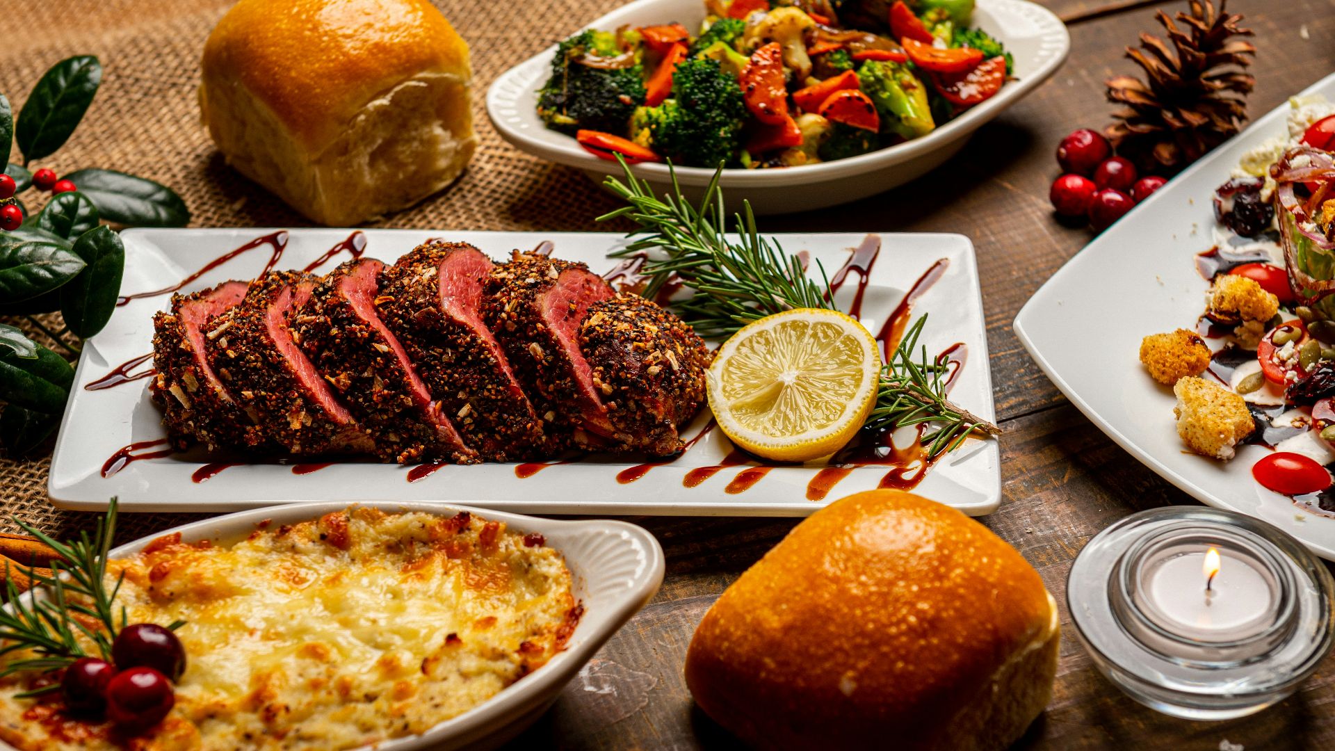 bread on white ceramic plate beside sliced bread on table