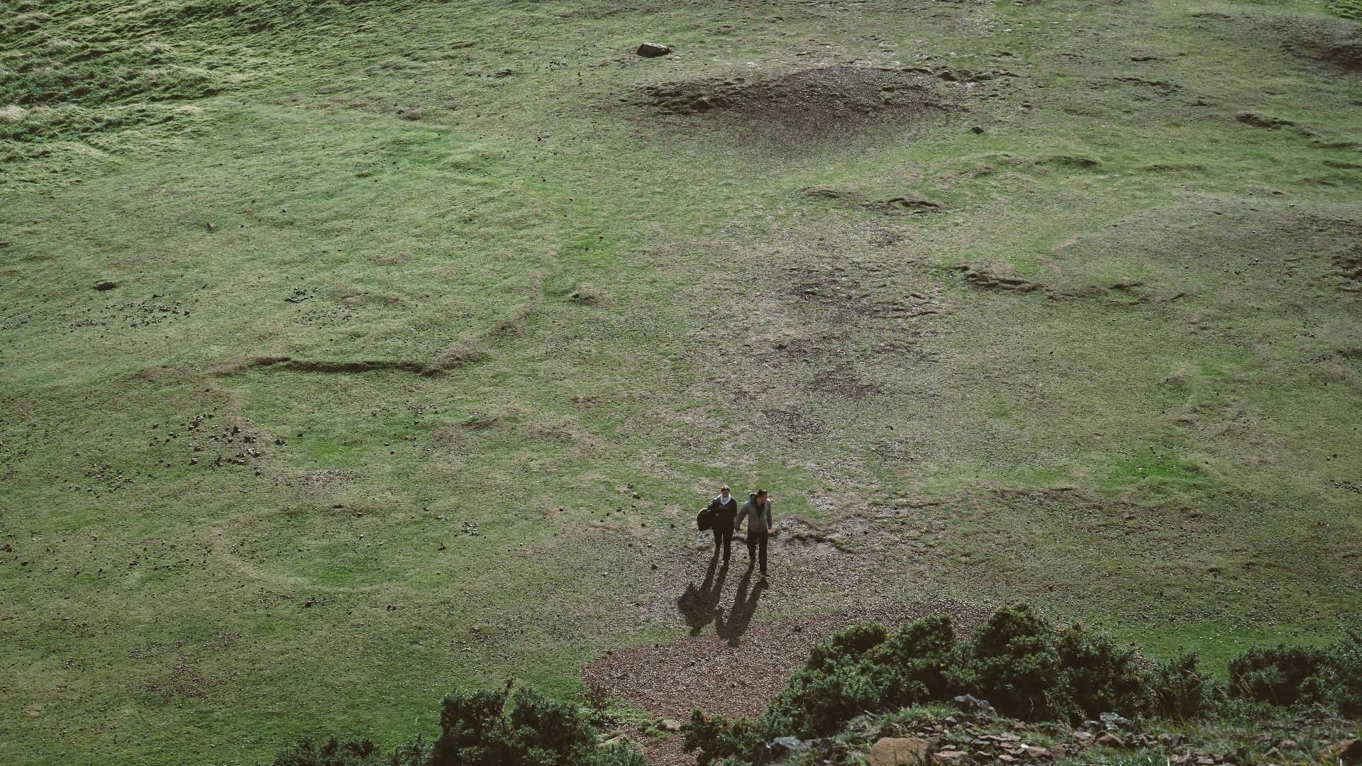 aerial view photography of two person standing at daytime