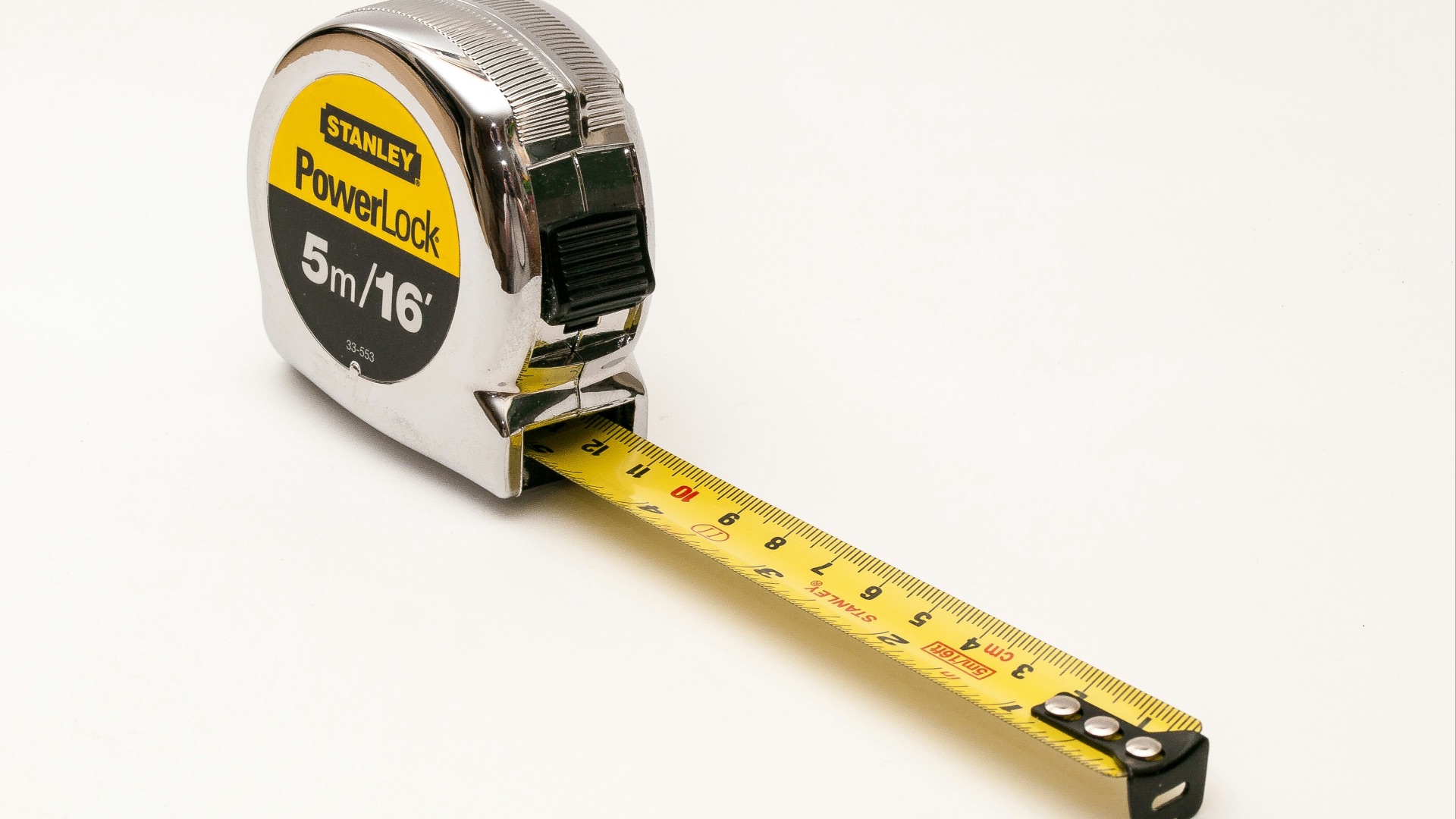 a close up of a tape measure on a white background