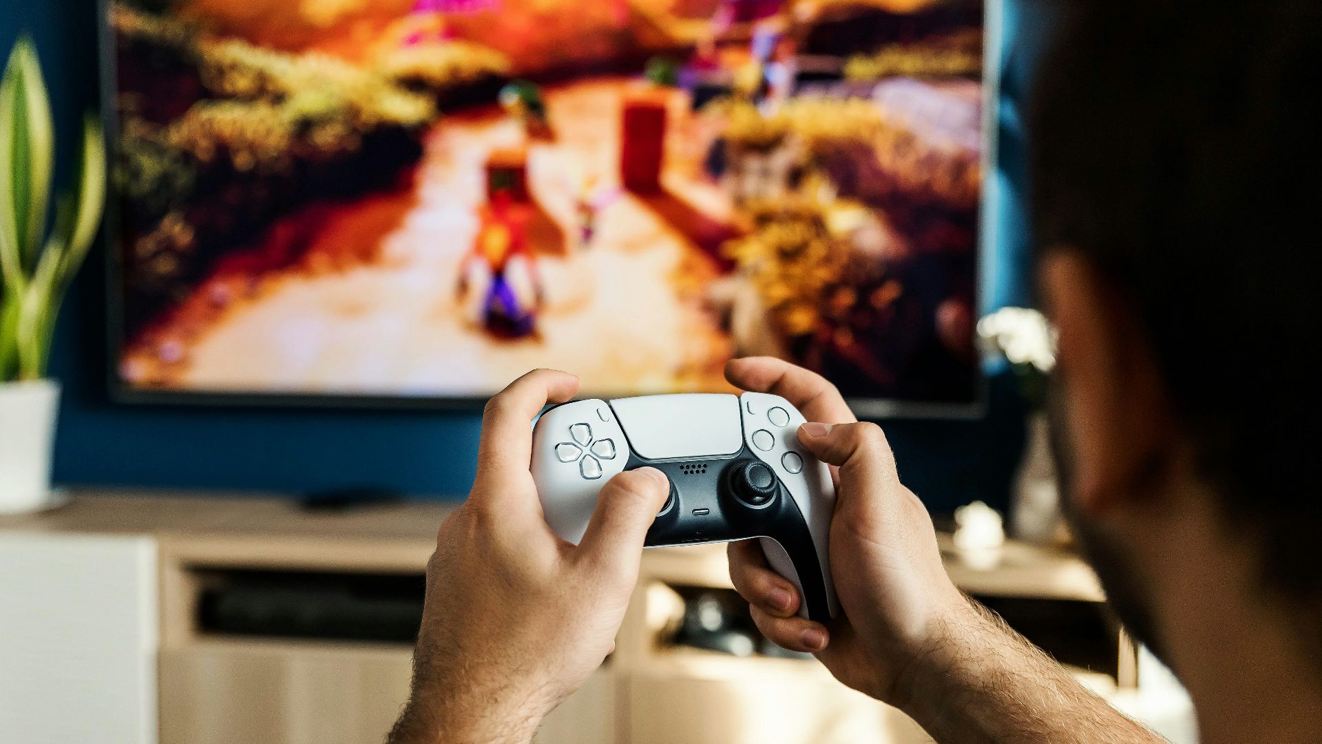 a man playing a video game on the nintendo wii