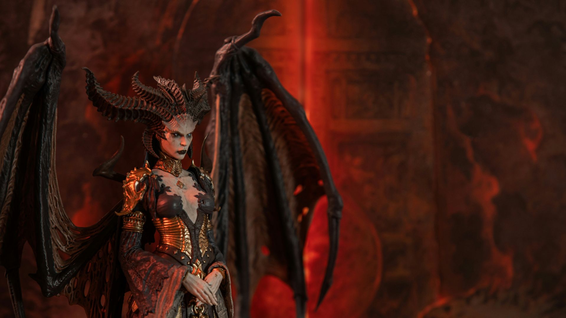 A demonic queen with large wings and horns.