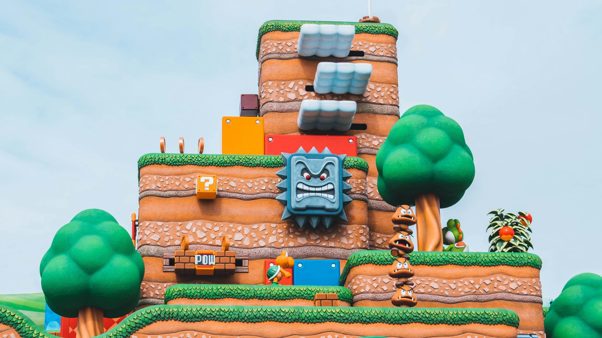 blue green and brown concrete building under blue sky during daytime