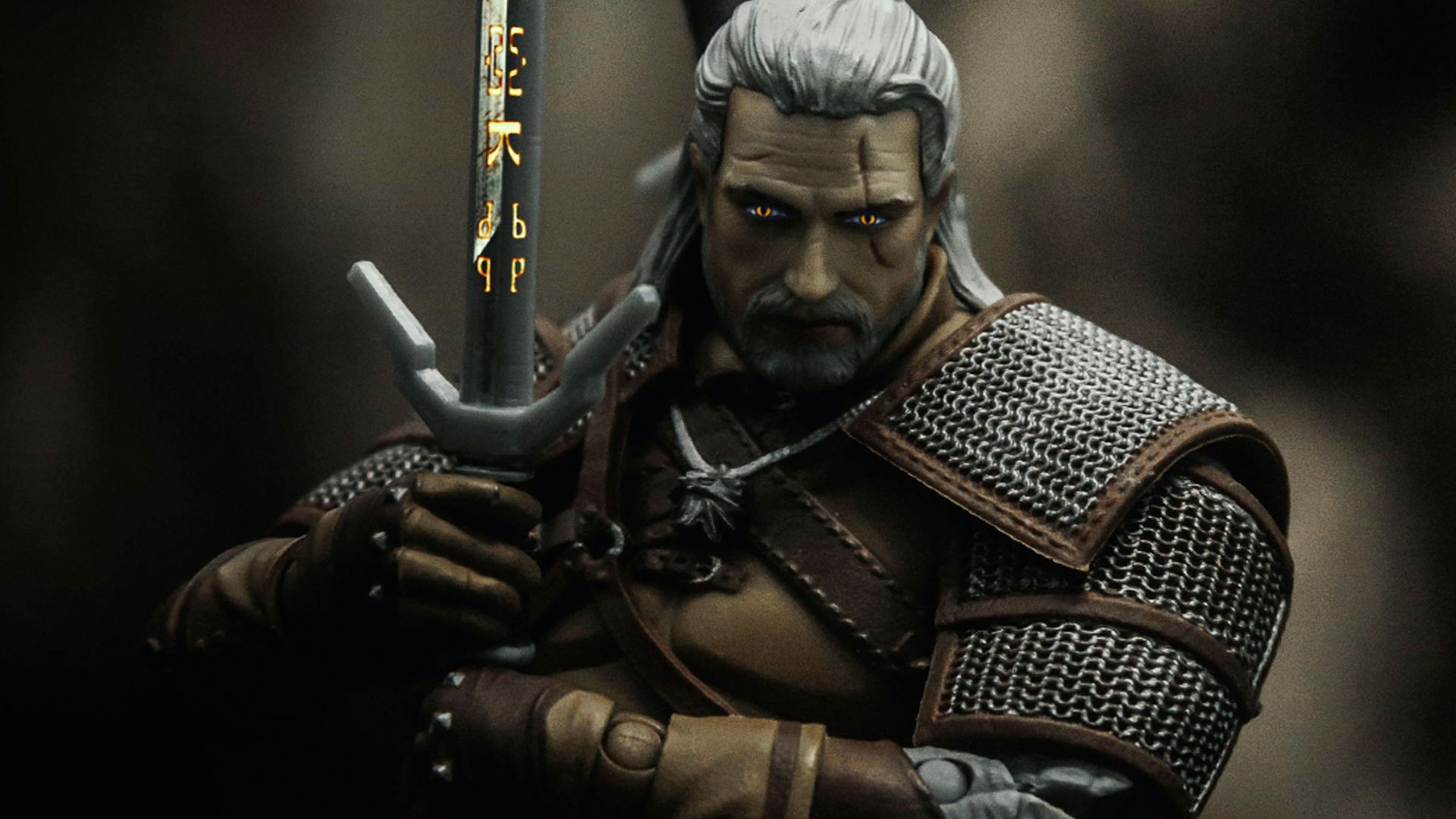 man in black and brown suit holding sword