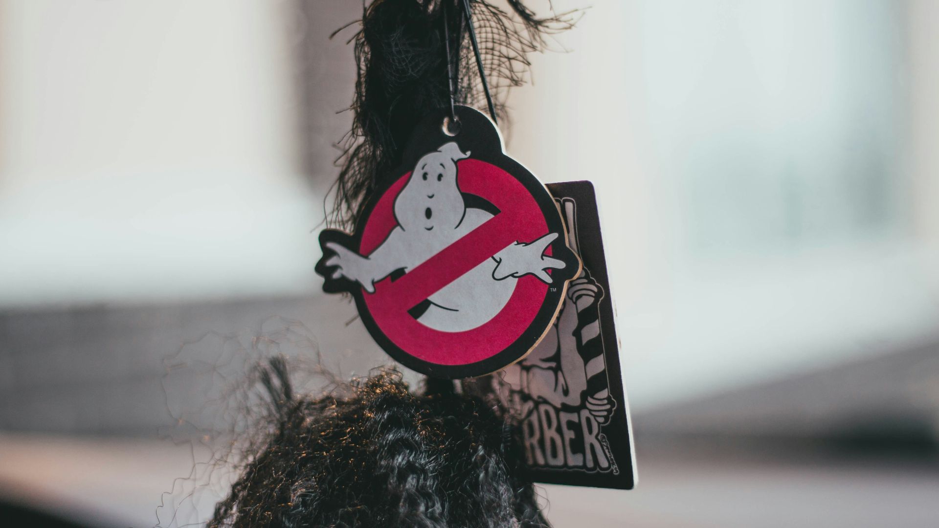 a close up of a car mirror with a sticker on it