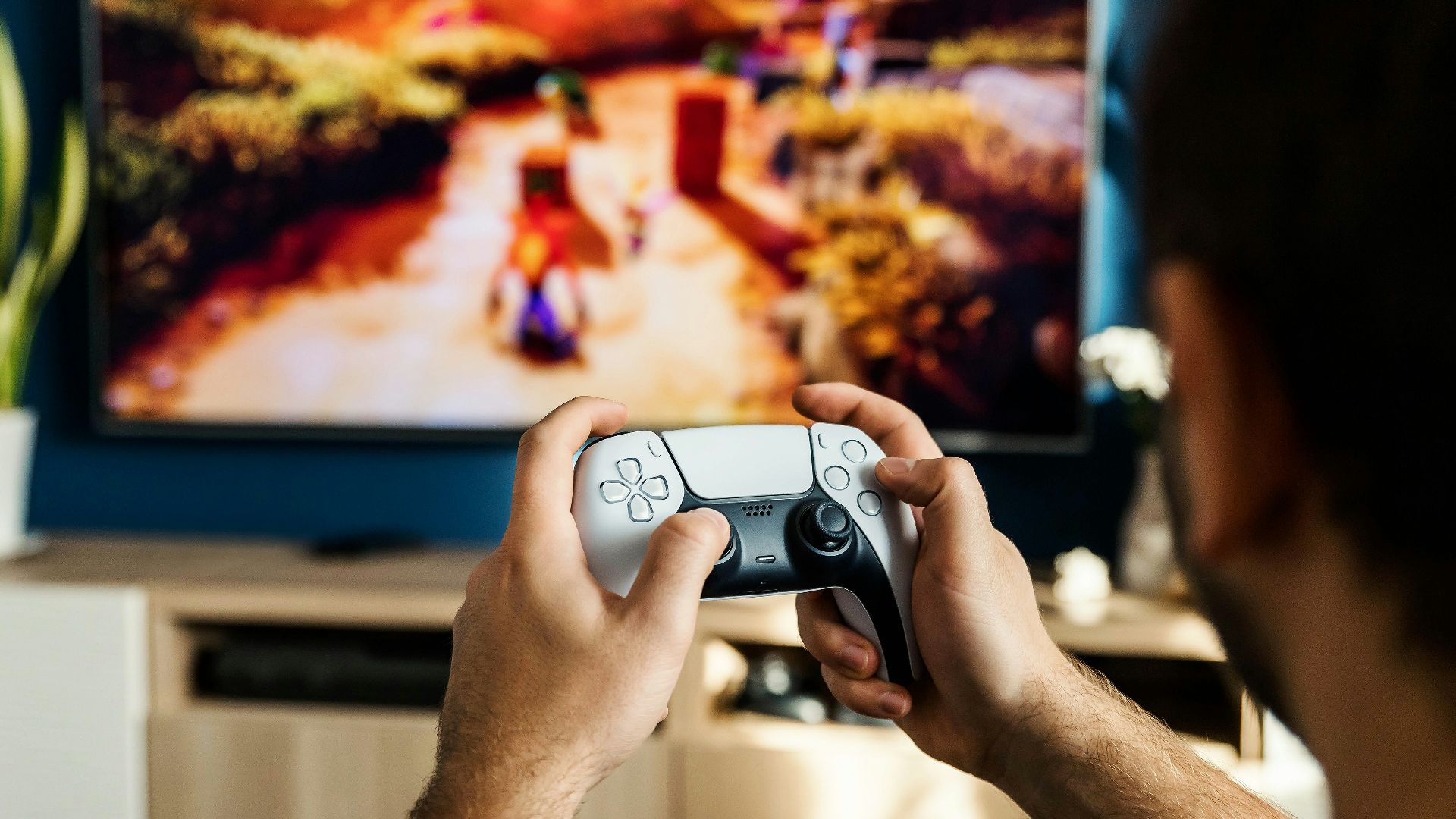 a man playing a video game on the nintendo wii