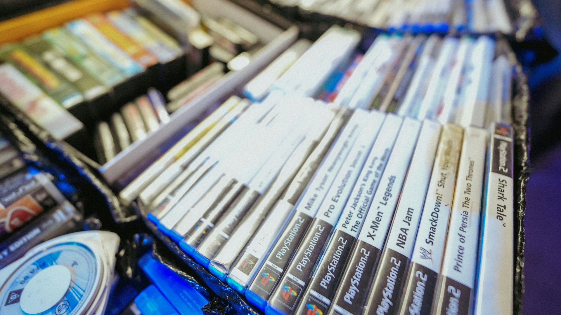 A collection of video games is on display.