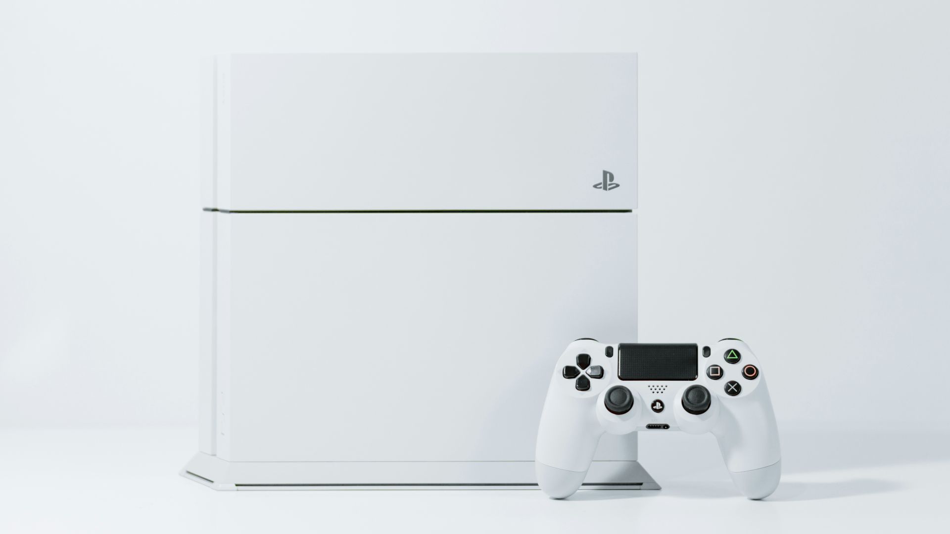 white Sony PS4 Original with controller